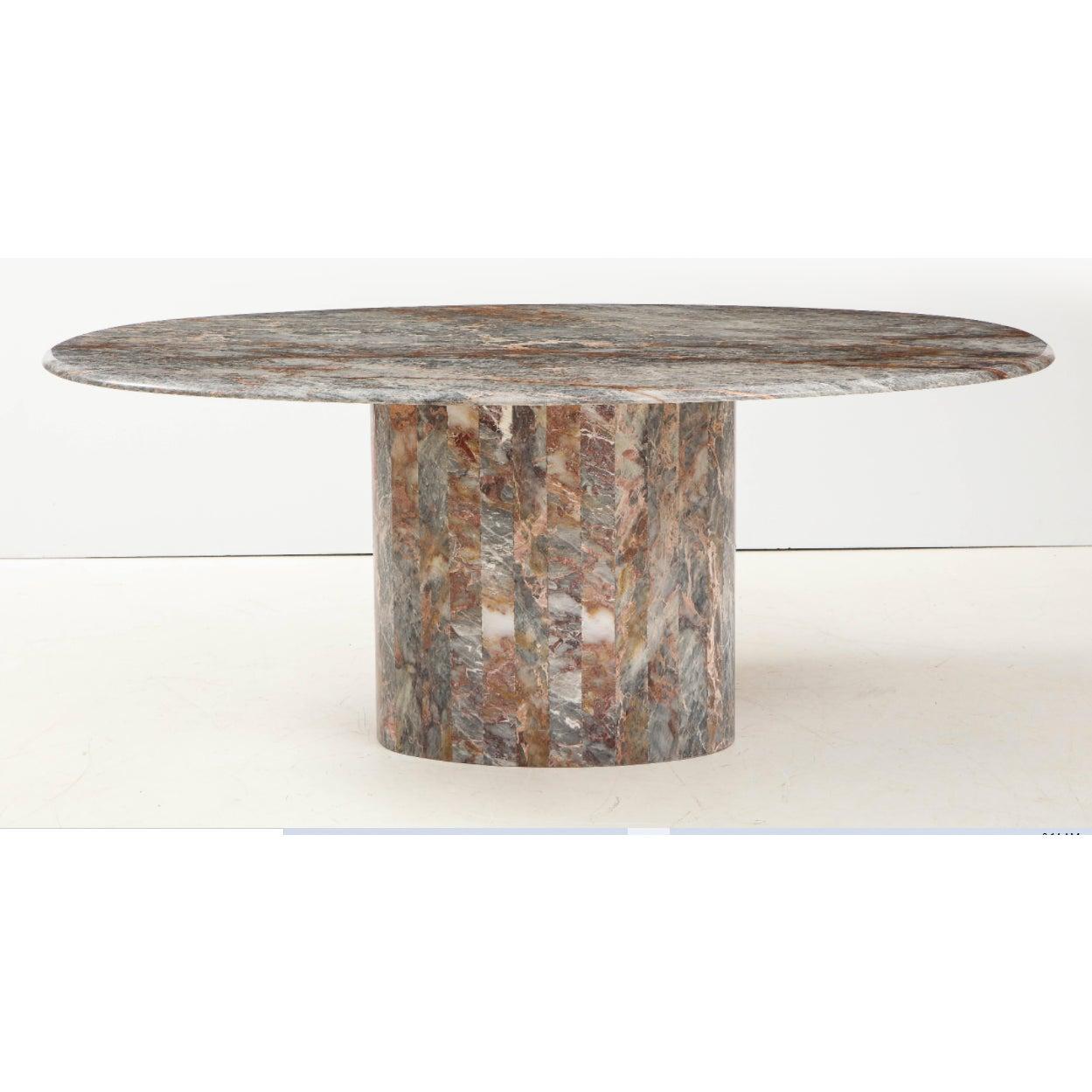Exquisite Roche-Bobois marble top dining table with stone base. Known as 