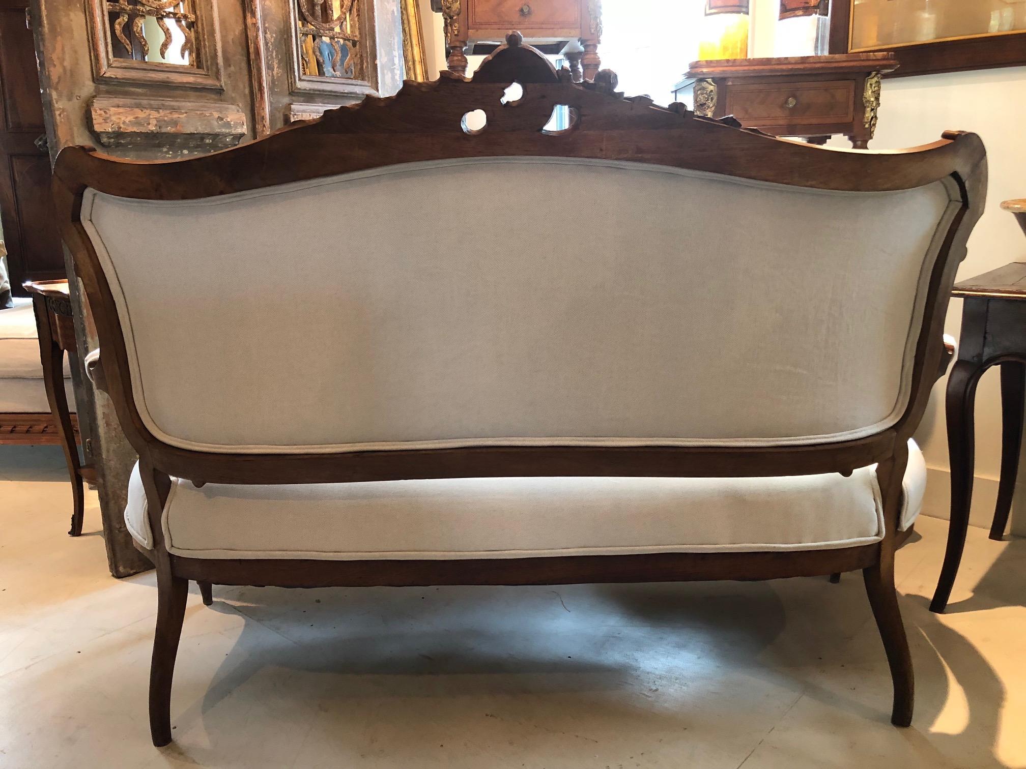 Sublimely Elegant Early French Carved Wood Sofa with New Upholstery In Good Condition In Hopewell, NJ