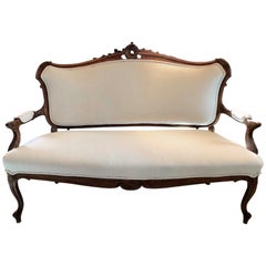 Sublimely Elegant Early French Carved Wood Sofa with New Upholstery