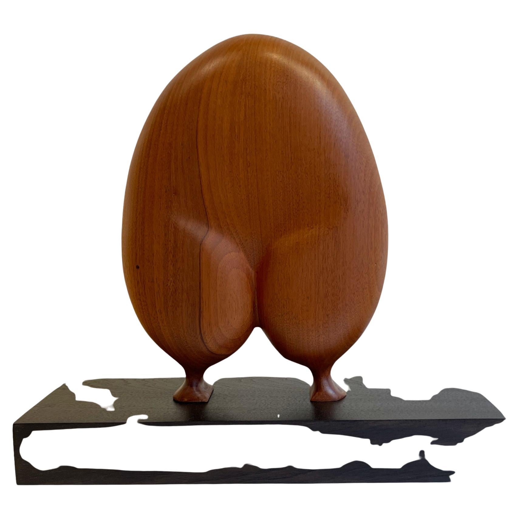 Mahogany is an all time favorite for fine wooden furniture. It is the benchmark for stability, has a rich consistent color, and finishes beautifully. This beautiful wood gives this small sculpture a warm and appealing 360? aesthetic. The sculpture