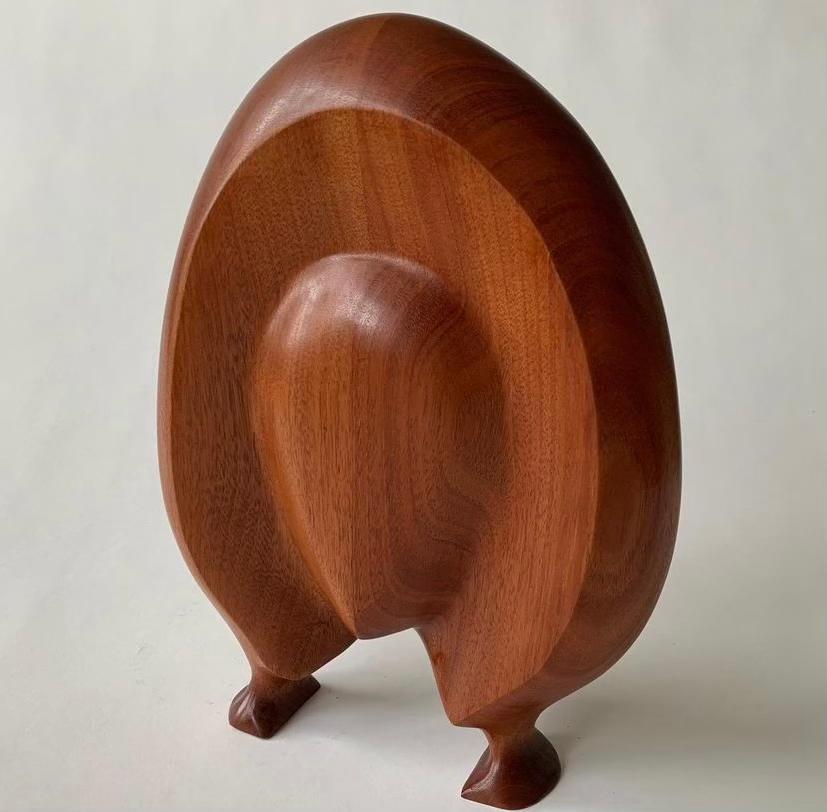 Contemporary Submission, Mahogany, Hand Carved Wooden Sculpture on Dark Base