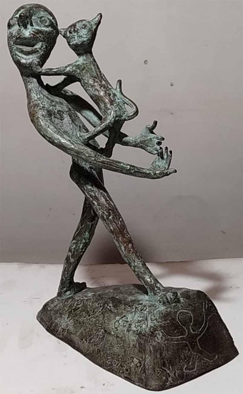 Subrata Biswas Figurative Sculpture - Amigo, Man with a Cat, Indian Folk Style, Green PatinaBronze Sculpture "In Stock"