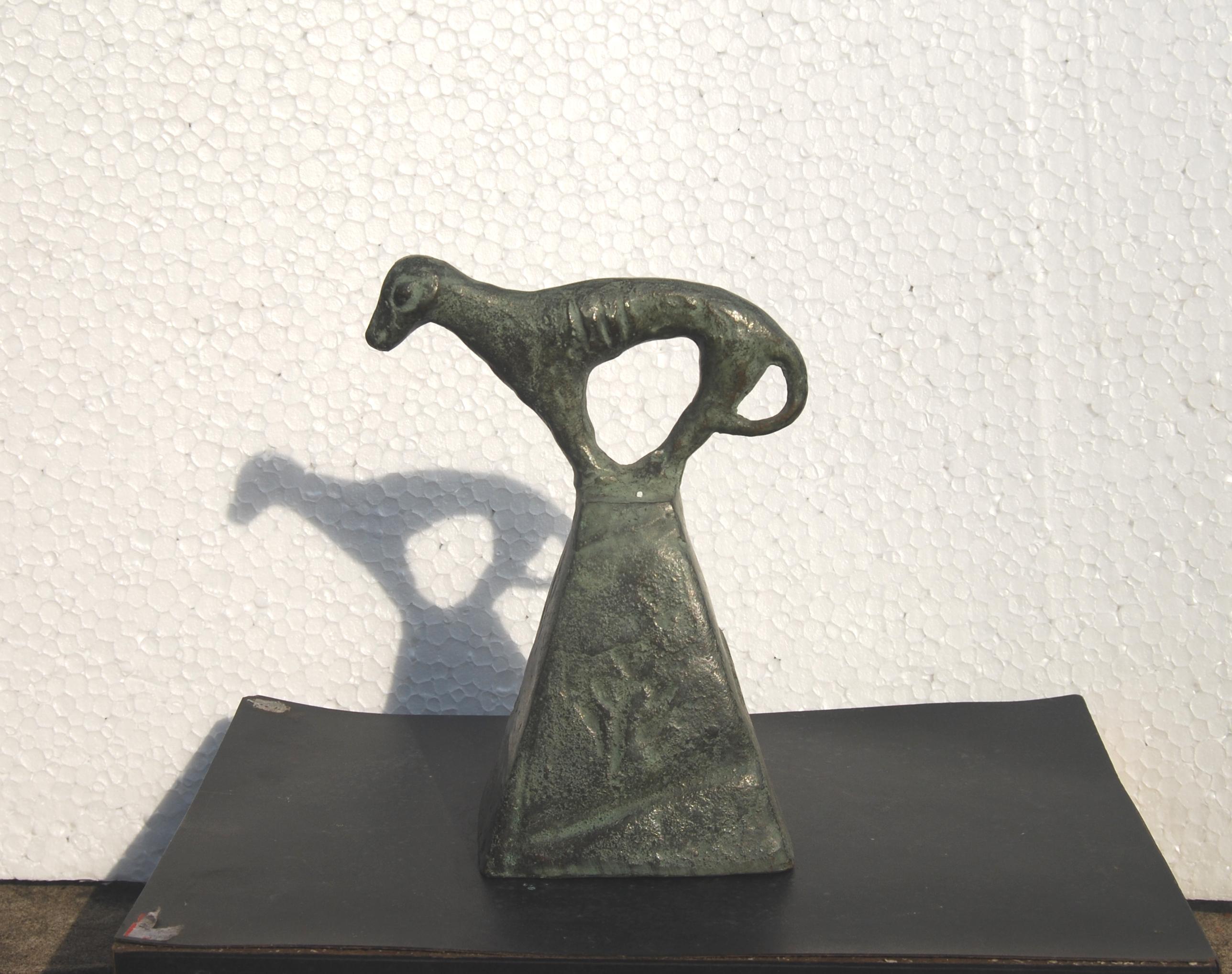 Subrata Biswas - Untitled - H: 6.5 Inches x W: 5 Inches X D: 3 Inches
Bronze Sculpture.

There is a fantastic element in the works which is brought about by transforming the motifs of a fish, kite, an animal etc into larger than life forms. It is