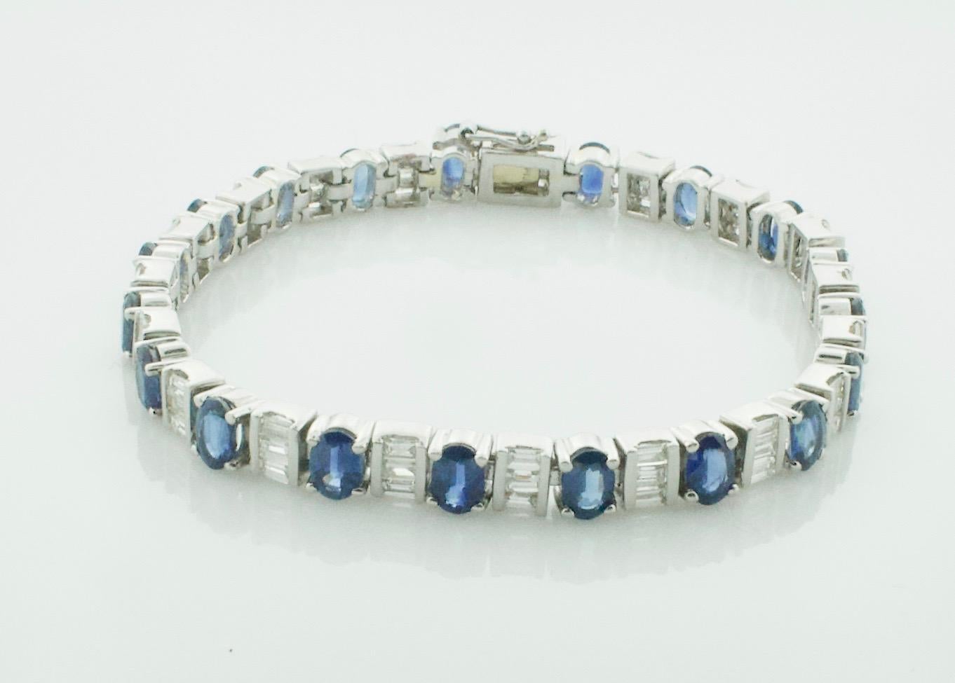 Substancial Sapphire and Diamond Tennis Bracelet 11.00 Carats in Platinum
Sixteen Oval Sapphires Weighing 11.00 Carats Approximately [bright with no imperfections visible to the naked eye]
Sixty Tapered Baguette Diamonds Weighing 4.25 Carats
