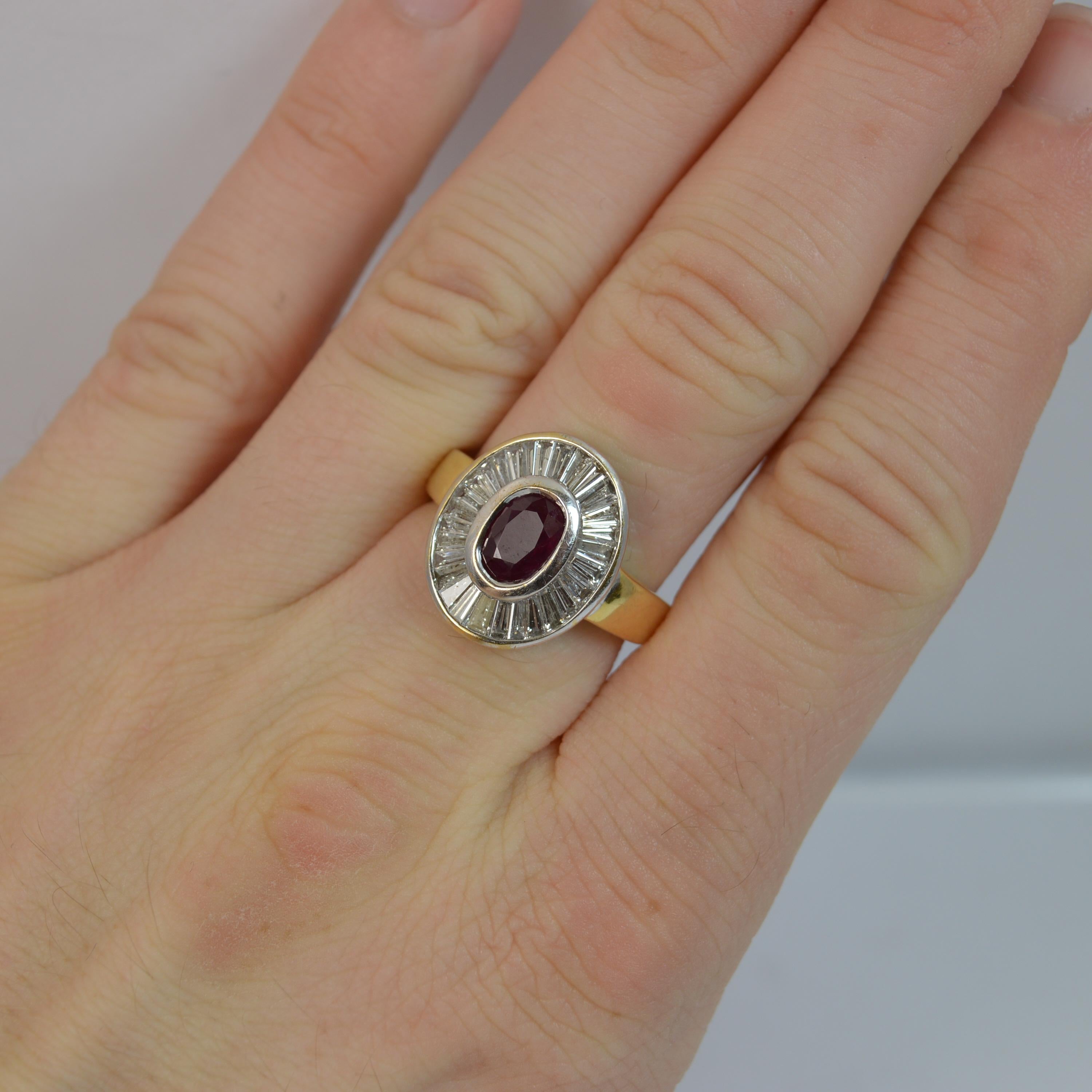 
A beautiful natural Ruby and Diamond cluster ring.

​Designed with an oval cut ruby to centre in a collet setting, all white gold. 5mm x 7.5mm ruby.

Surrounding are approx 30 natural tapered baguette cut diamonds to total 1.50 carats.

13.5mm x