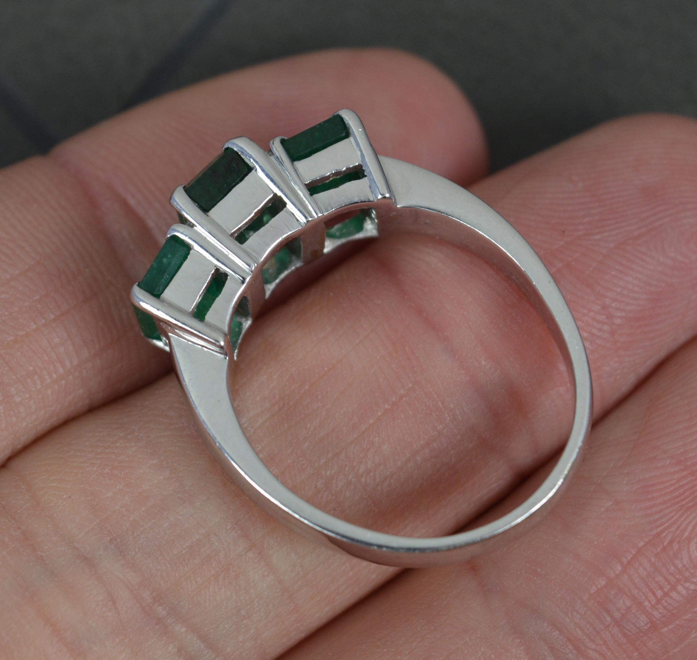 Emerald Cut Substantial 18 Carat White Gold and Natural Emerald Trilogy Ring