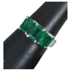 Substantial 18 Carat White Gold and Natural Emerald Trilogy Ring