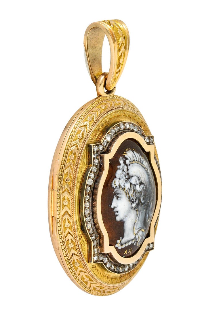 Substantial oval locket features an enamel portrait of a woman - opaque white and golden brown

With a rose cut diamond halo weighing in total approximately 1.00 carat - quality consistent with age

Surround is ornately engraved with scrolls, gold