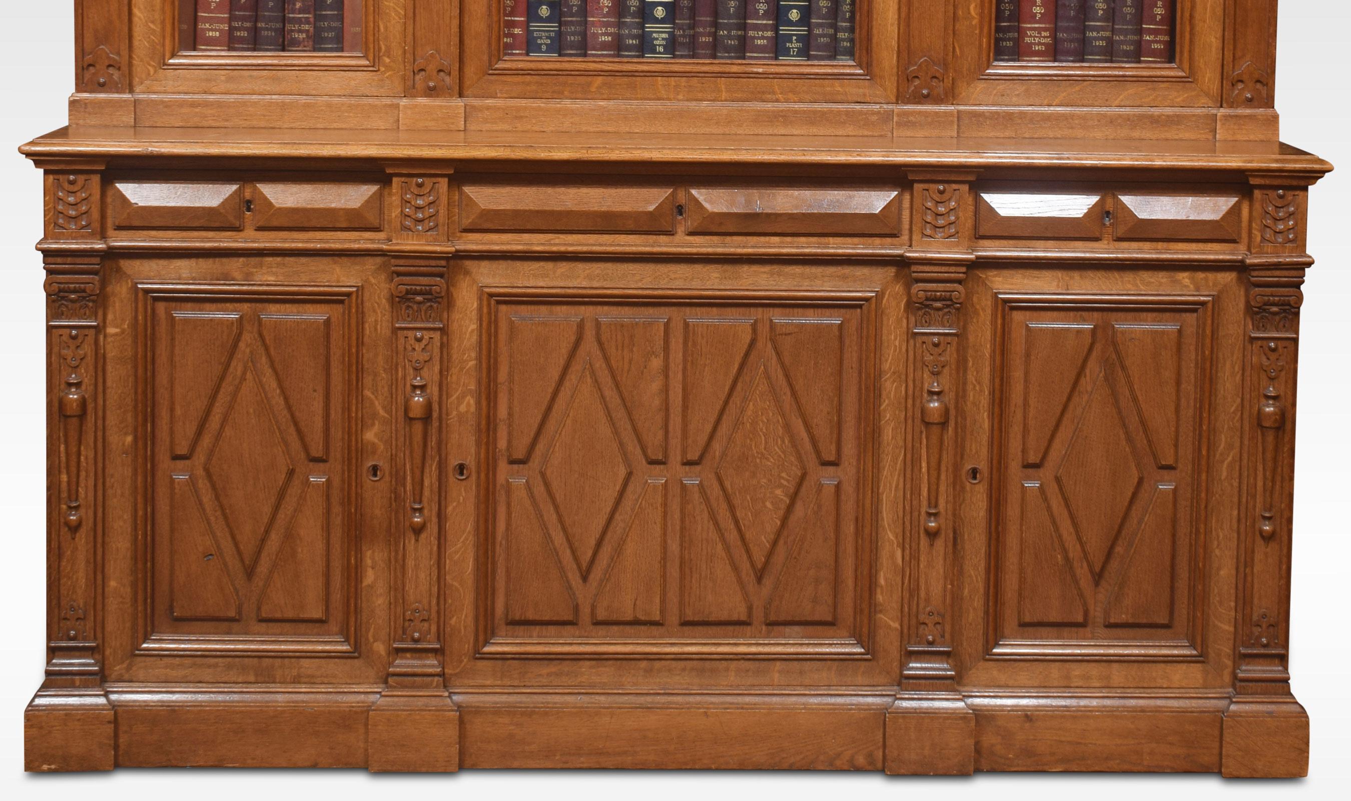 British Substantial 19th Century Carved Oak Bookcase For Sale