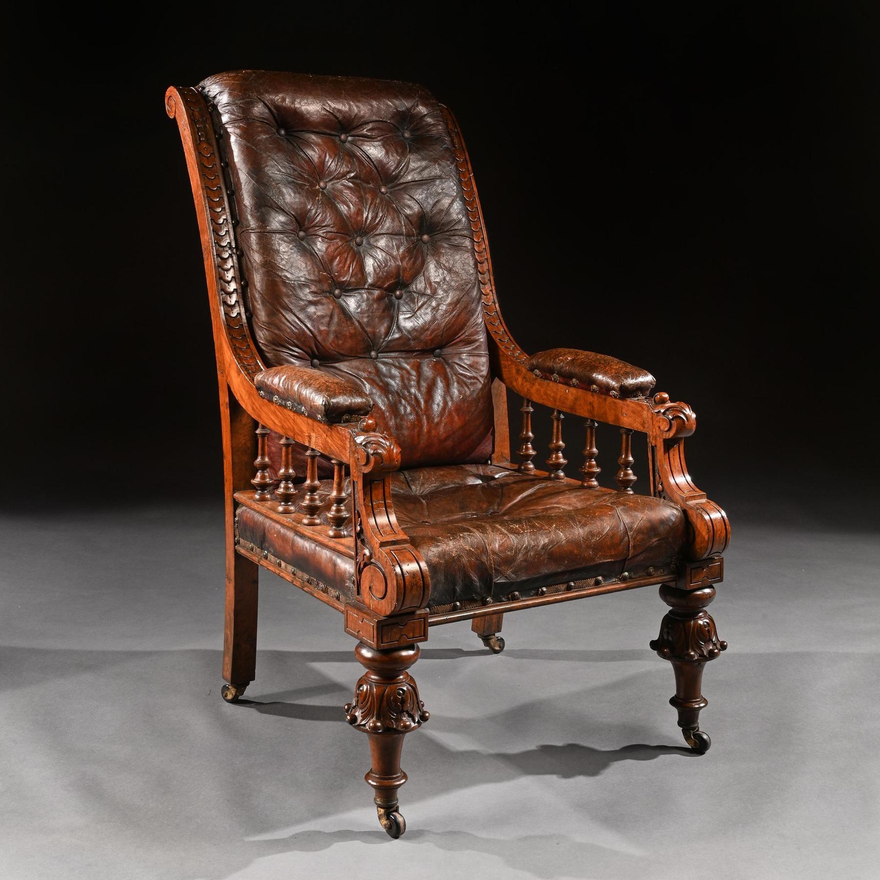 Of grand proportions a 19th century oak armchair retaining its original Moroccan leather upholstery.

English circa 1880.

Standing almost 4 feet tall this imposing chair is in wonderful original condition. Having a scrolled leather deep