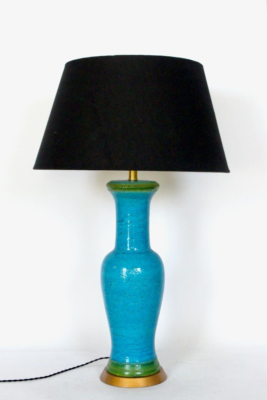 Tall Aldo Londi Bitossi Incised Rimini Blue & Green Stripe glazed Pottery Lamp. Featuring his classic handcrafted reflective glazed vase form in textured Turquoise with Spring Green banding and incised hand decoration to top and bottom of pottery.