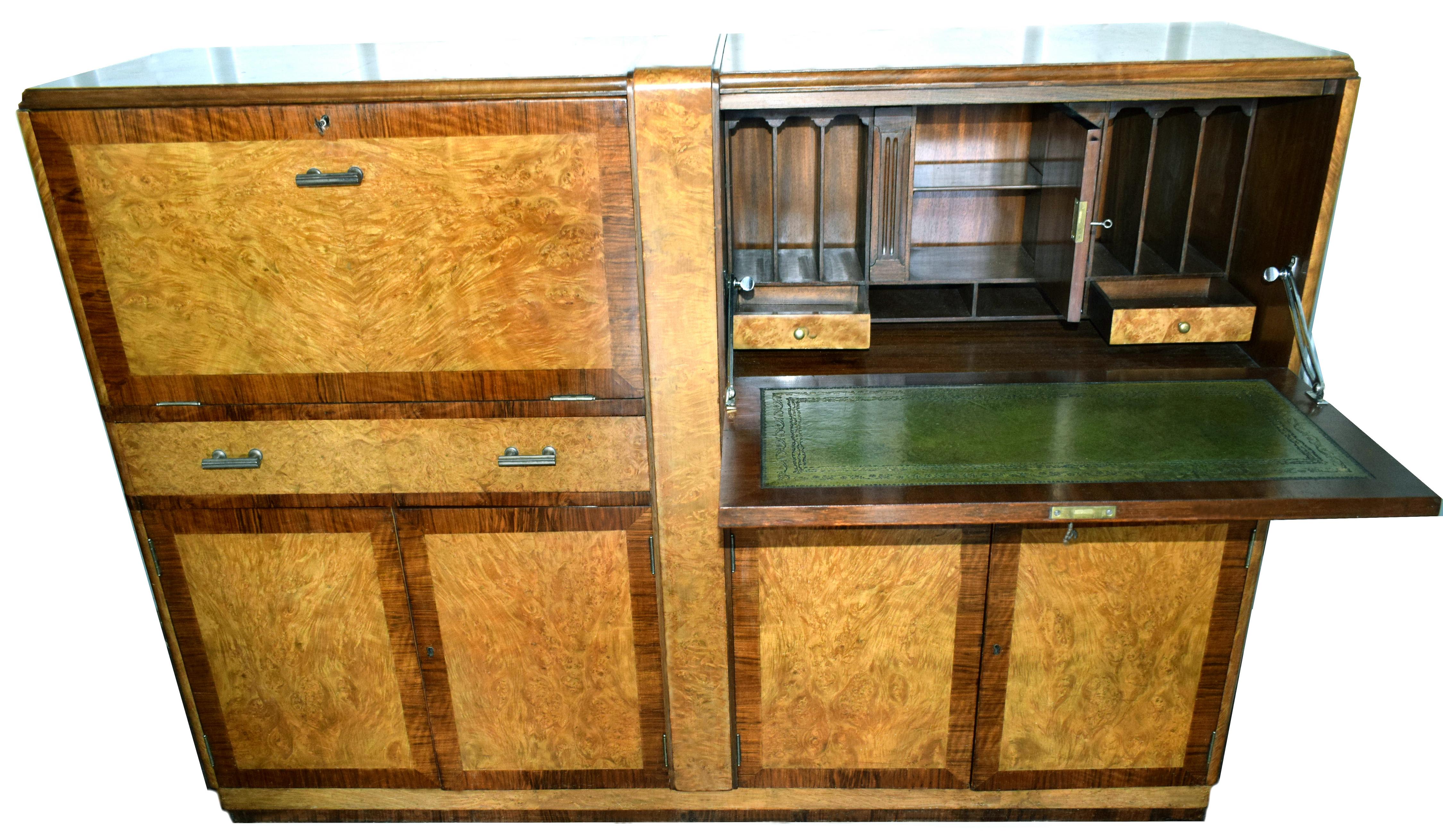 A golden opportunity to acquire a substantial bureau that not only looks very impressive but is extremely functional too! This Art Deco bureau is in a true blonde maple veneer with walnut feather banding to the edges, base wood is Mahogany. An