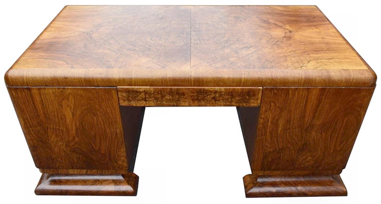 Superb 1930s Art Deco desk, European made from possibly Belgium or French. We sourced from a private residence in London, England who have lovely looked after this piece since the 1940s. Very generous storage on this desk with four paper tray