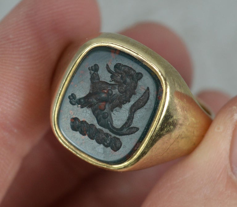 Substantial Bloodstone Intaglio and Yellow Gold Unisex Signet Lion Seal Ring In Excellent Condition In St Helens, GB