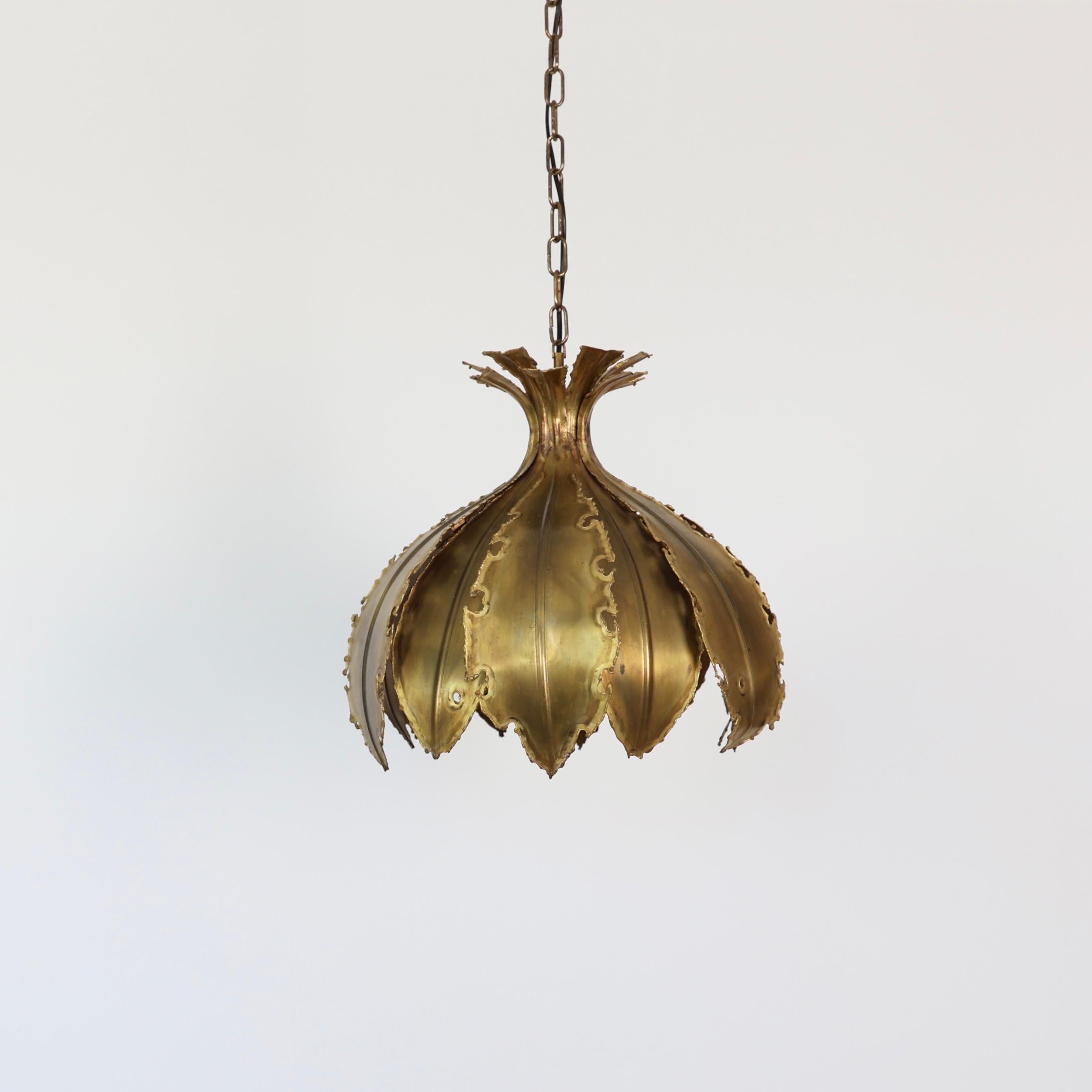 Substantial Onion-Shaped Brutalist Brass Pendant Light designed Svend Aage Holm Sørensen in the 1960s.  

* Large pendant light with layered flame-cut brass slates
* Designer: Svend Aage Holm Sørensen
* Type: 6395 (commonly referred to as “The