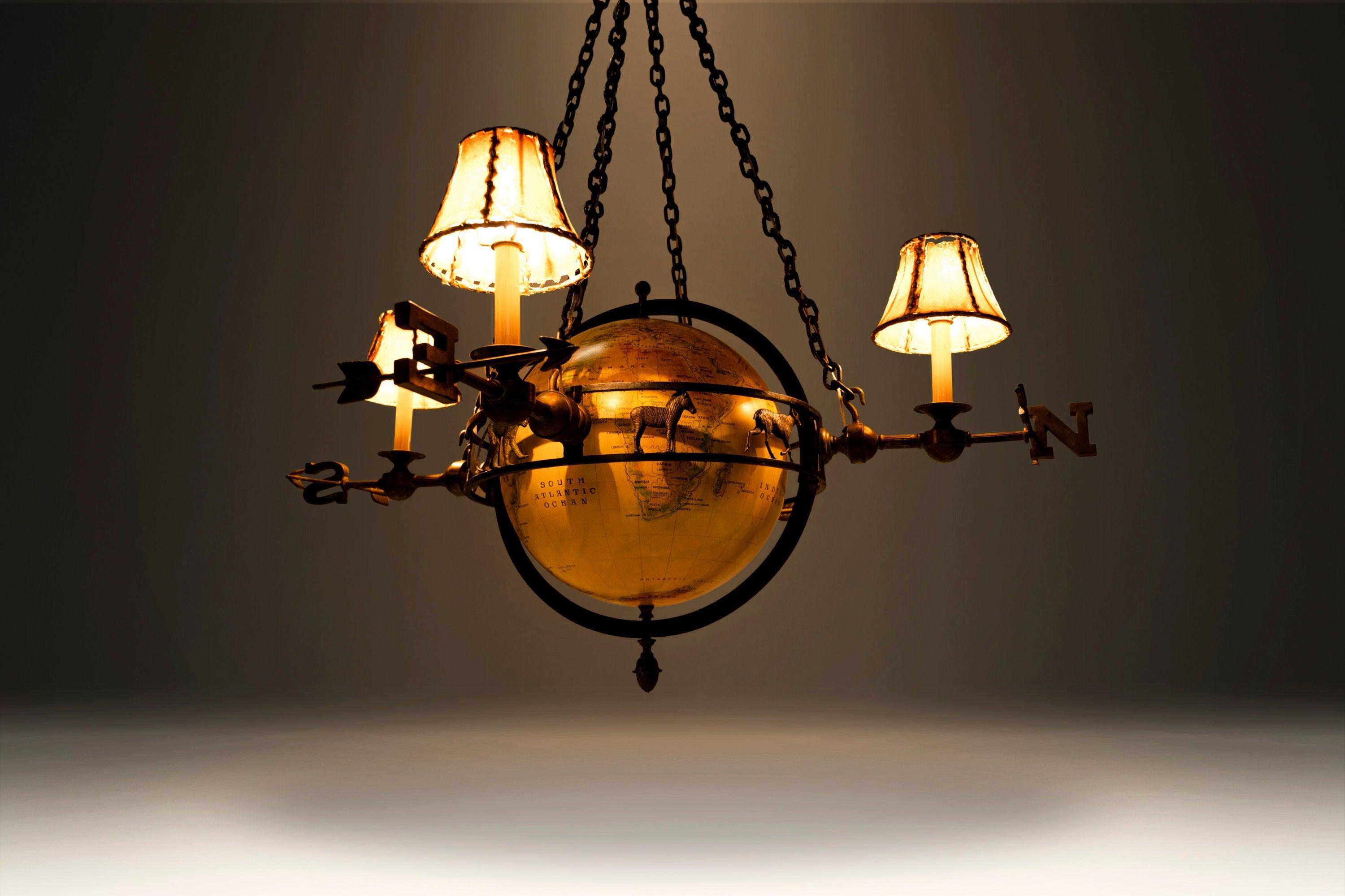 Attention collectors! This truly extraordinary chandelier, made by Maitland-Smith, is the epitome of 'Safari'. In 100% original, vintage condition and constructed of perfectly patinaed solid brass this one of a kind piece is sure to make a BOLD