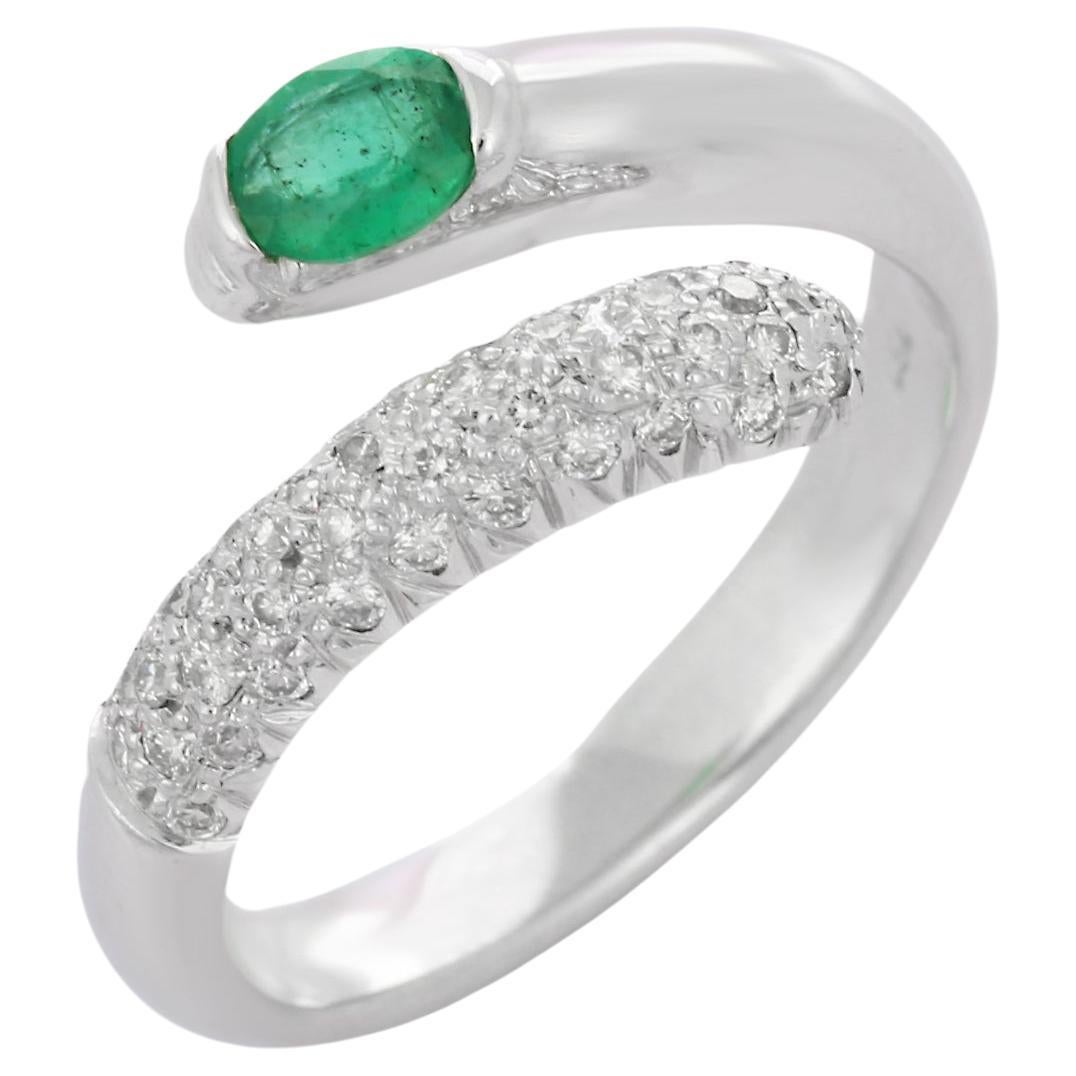 Substantial 18K White Gold Emerald Bypass Ring with Diamonds