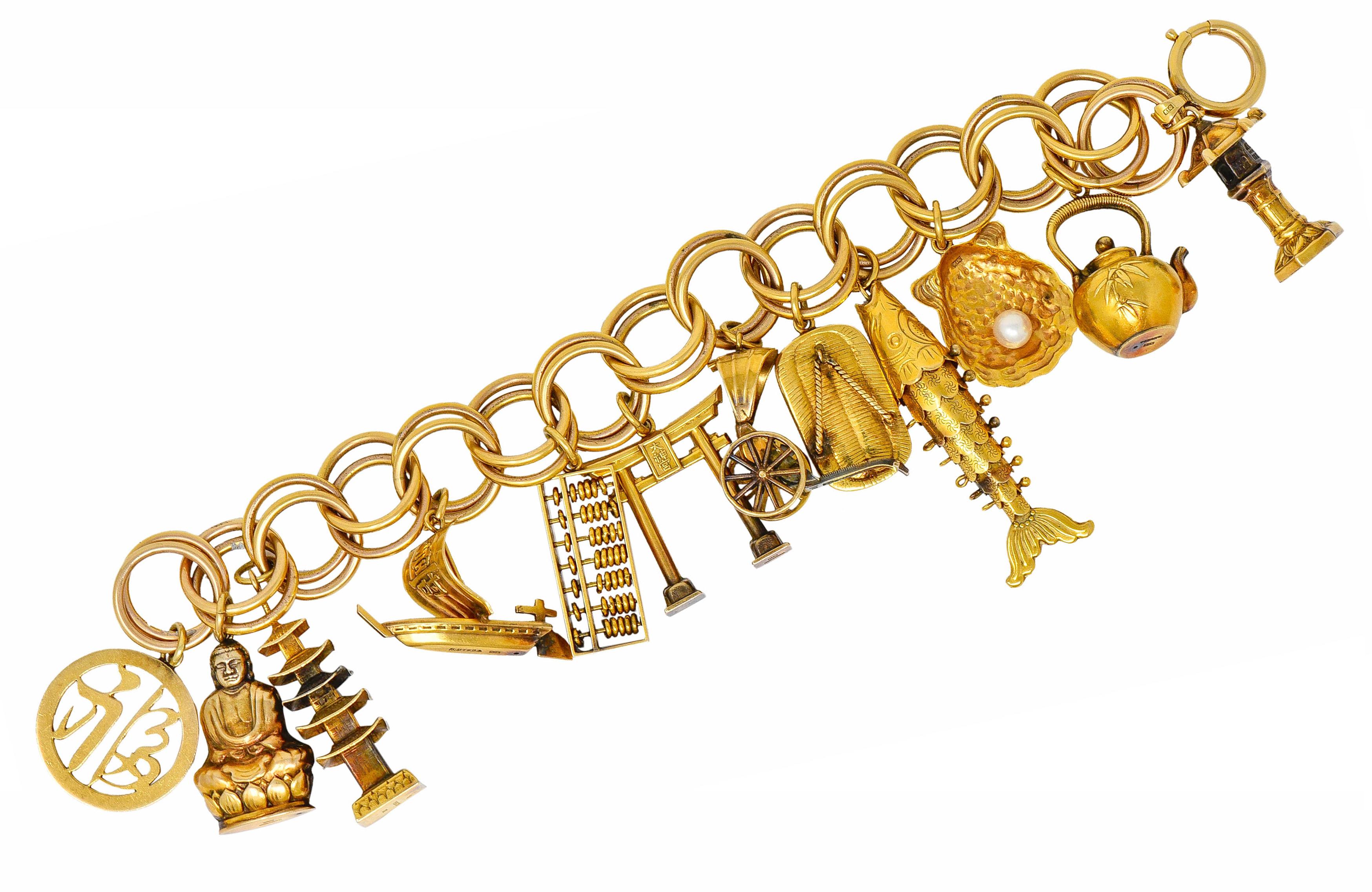 Charm bracelet is comprised of large round links, doubled

Suspending twelve large charms of Japanese icons

Circular character, Buddha, pagoda tower, wasen sailboat, abacus, Torii gate, rickshaw carriage, waraji sandal, articulated fish, shell with