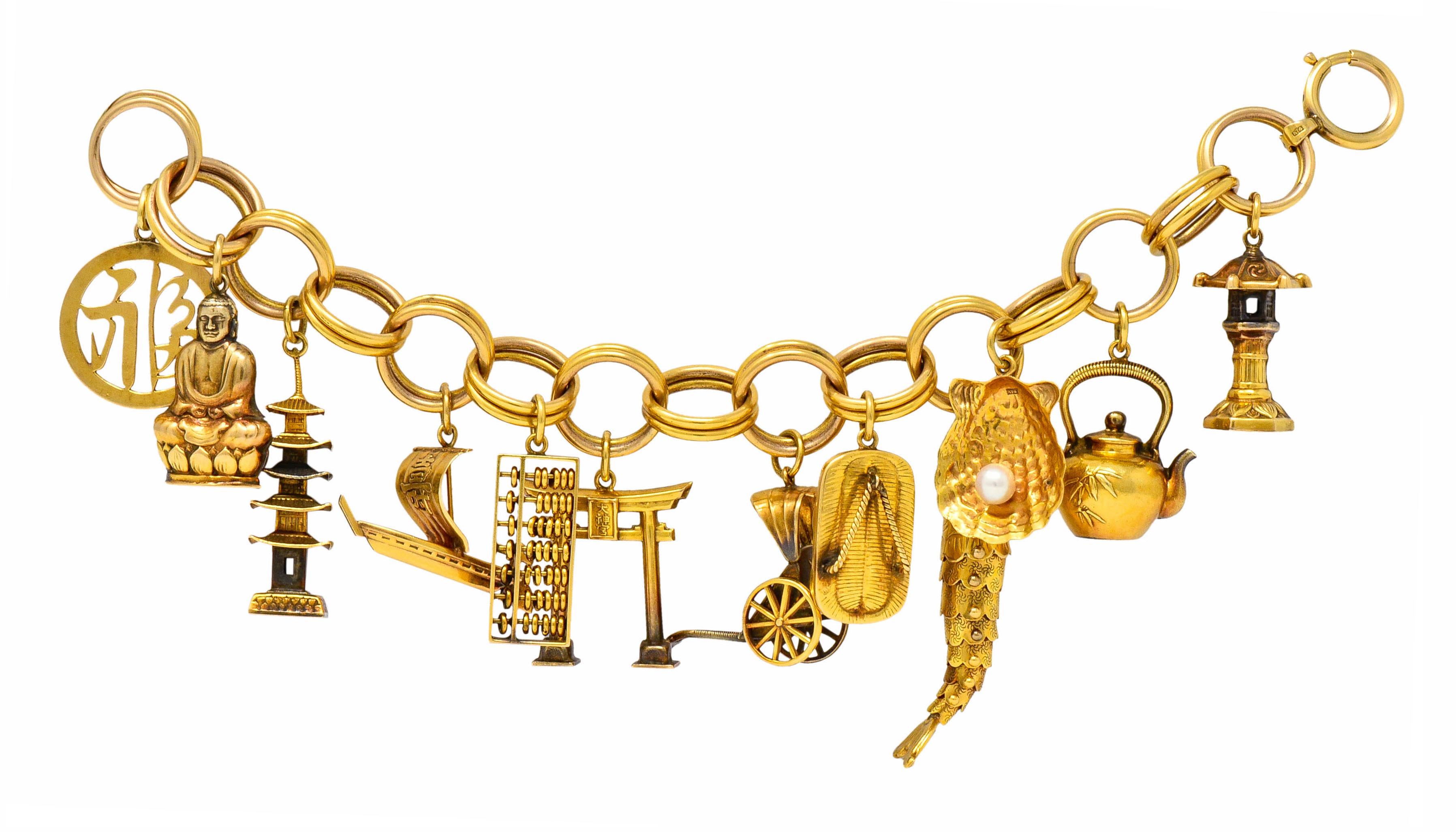 Charm bracelet is comprised of large round links, doubled

Suspending twelve large charms of Japanese icons

Circular character, Buddha, pagoda tower, wasen sailboat, abacus, Torii gate, rickshaw carriage, waraji sandle, articulated fish, shell with