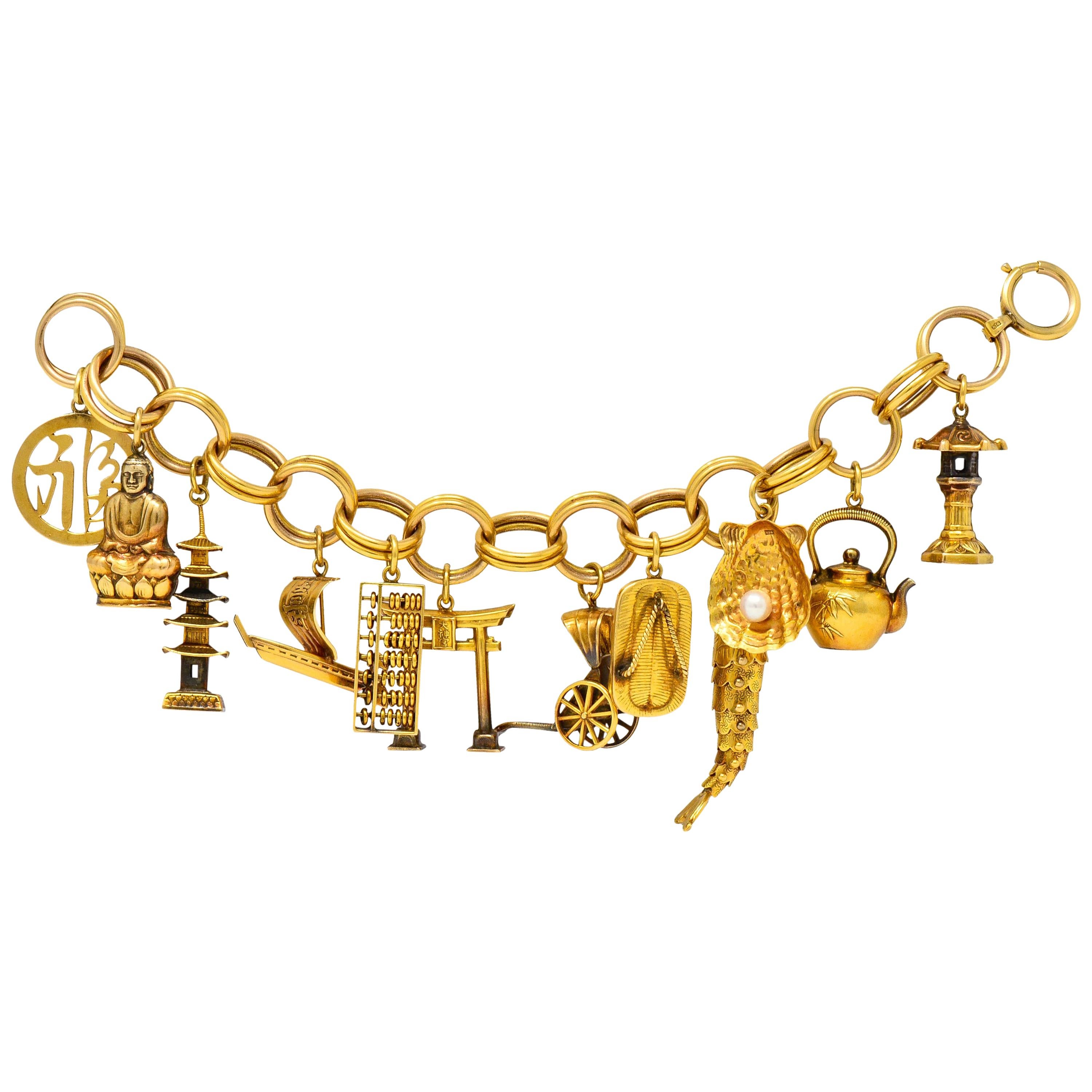 Substantial Kichigoro Uyeda Retro Pearl 14 Karat Gold Japanese Charm Bracelet