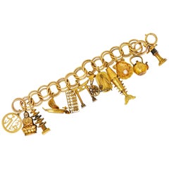 Substantial Kichigoro Uyeda Retro Pearl 14 Karat Gold Japanese Charm Bracelet