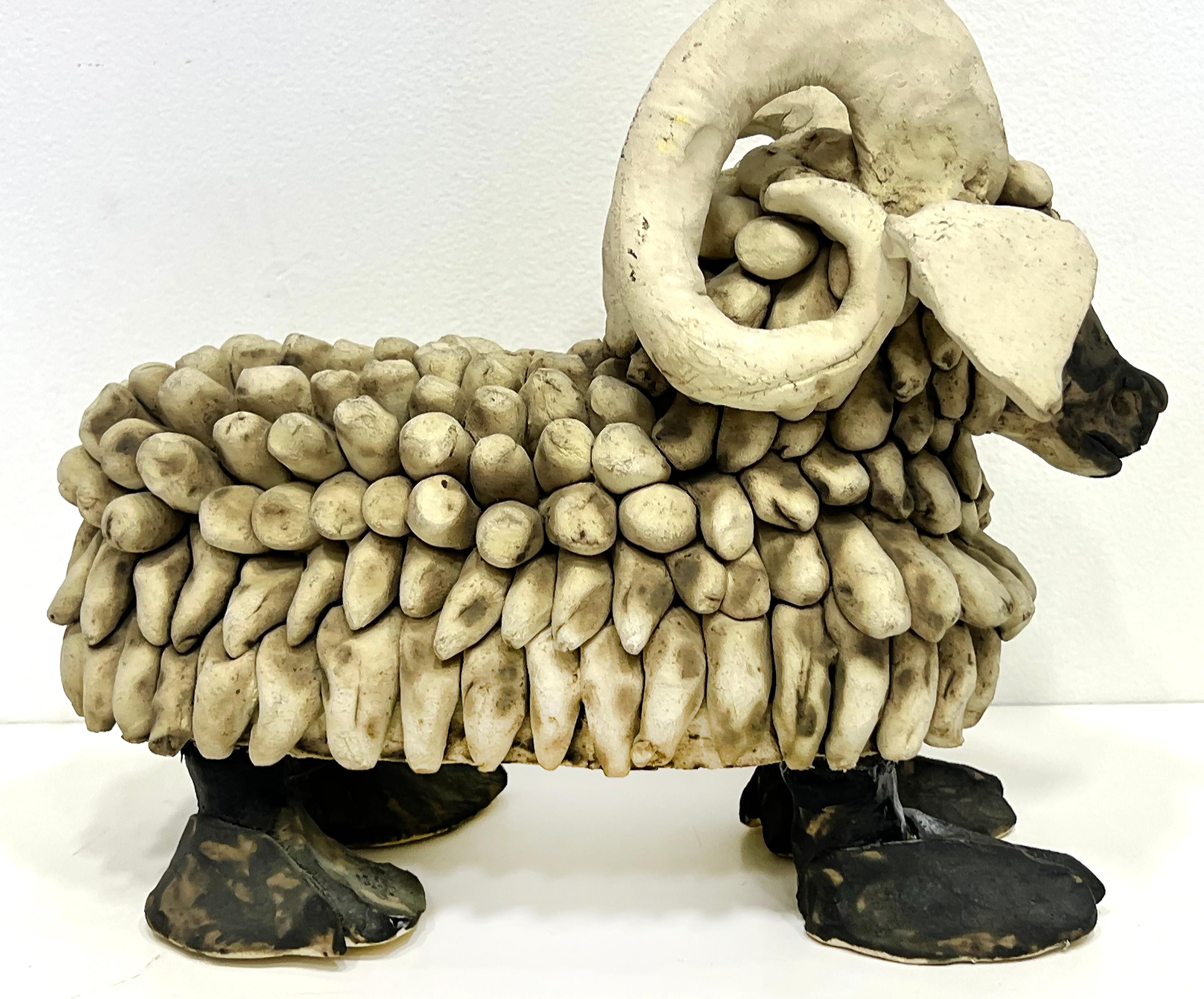 Substantial Mid-century Modern Pottery Ram Sculpture

Offered for sale is a substantial hand-built pottery ram sculpture from the 1970s. The piece is heavy and has great details. It's a whimsical piece and will look great on a table or