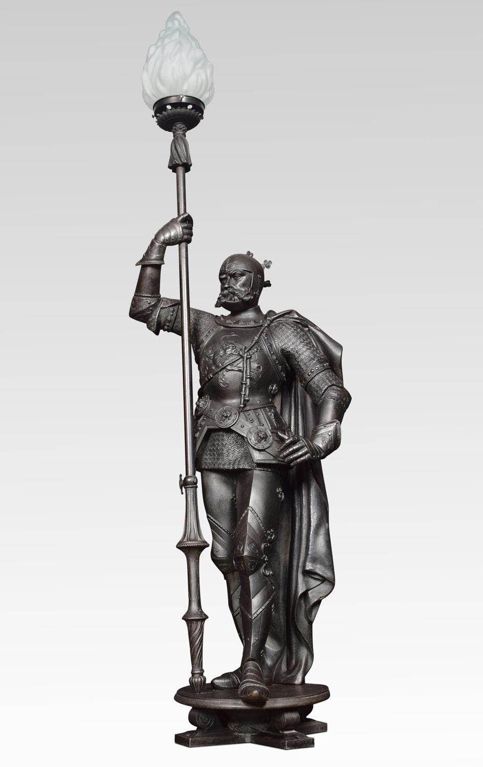 Very large pair of 19th century cast iron figures of knights having his armoured breastplate and robe, one hand clenching a flaming torch.(the lamps have been converted to electricity and wired.)
Dimensions
Height 61 inches
Width 18 inches
Depth