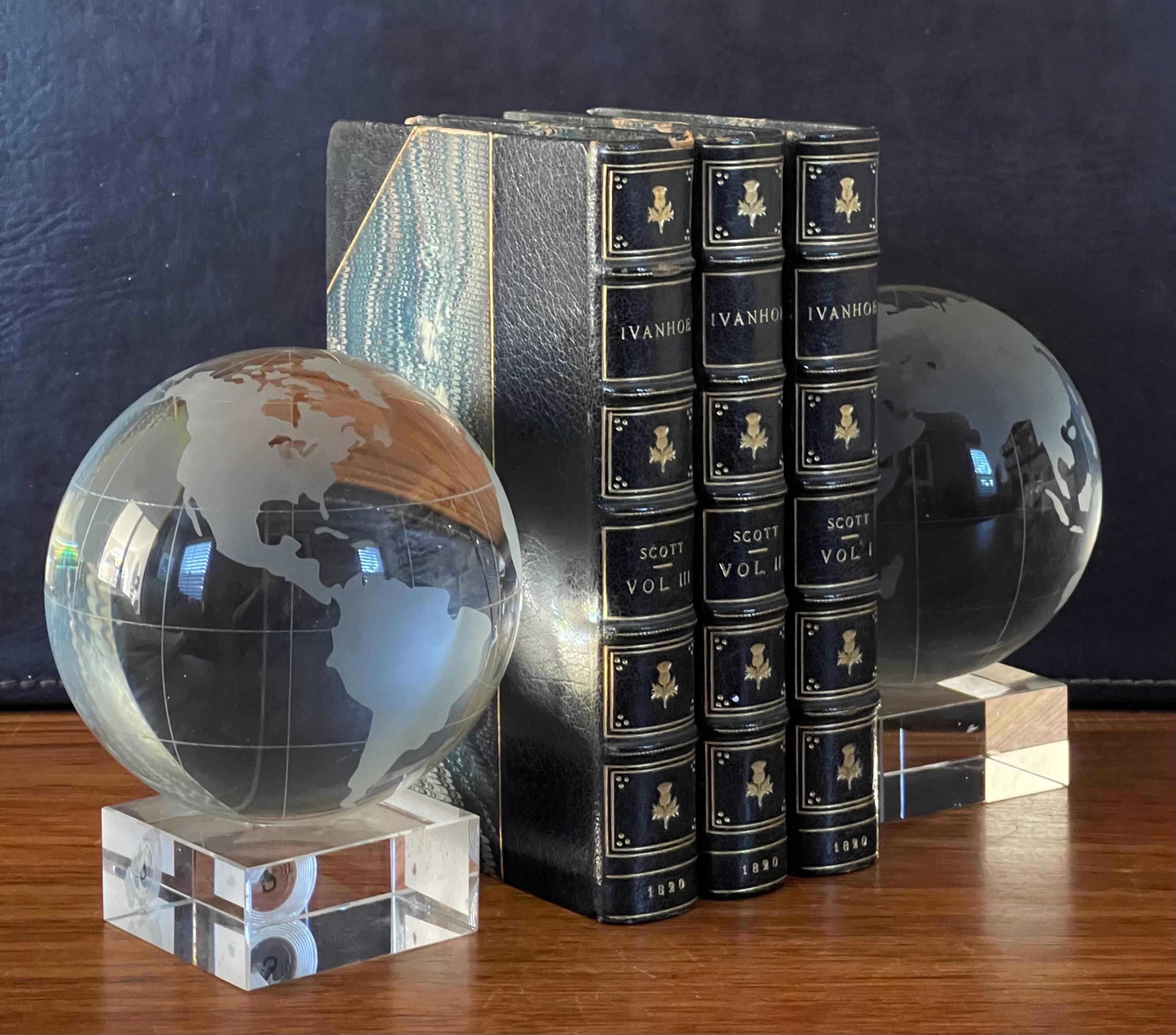 Modern Substantial Pair of Etched Crystal Globe Bookends by Nicole Miller For Sale