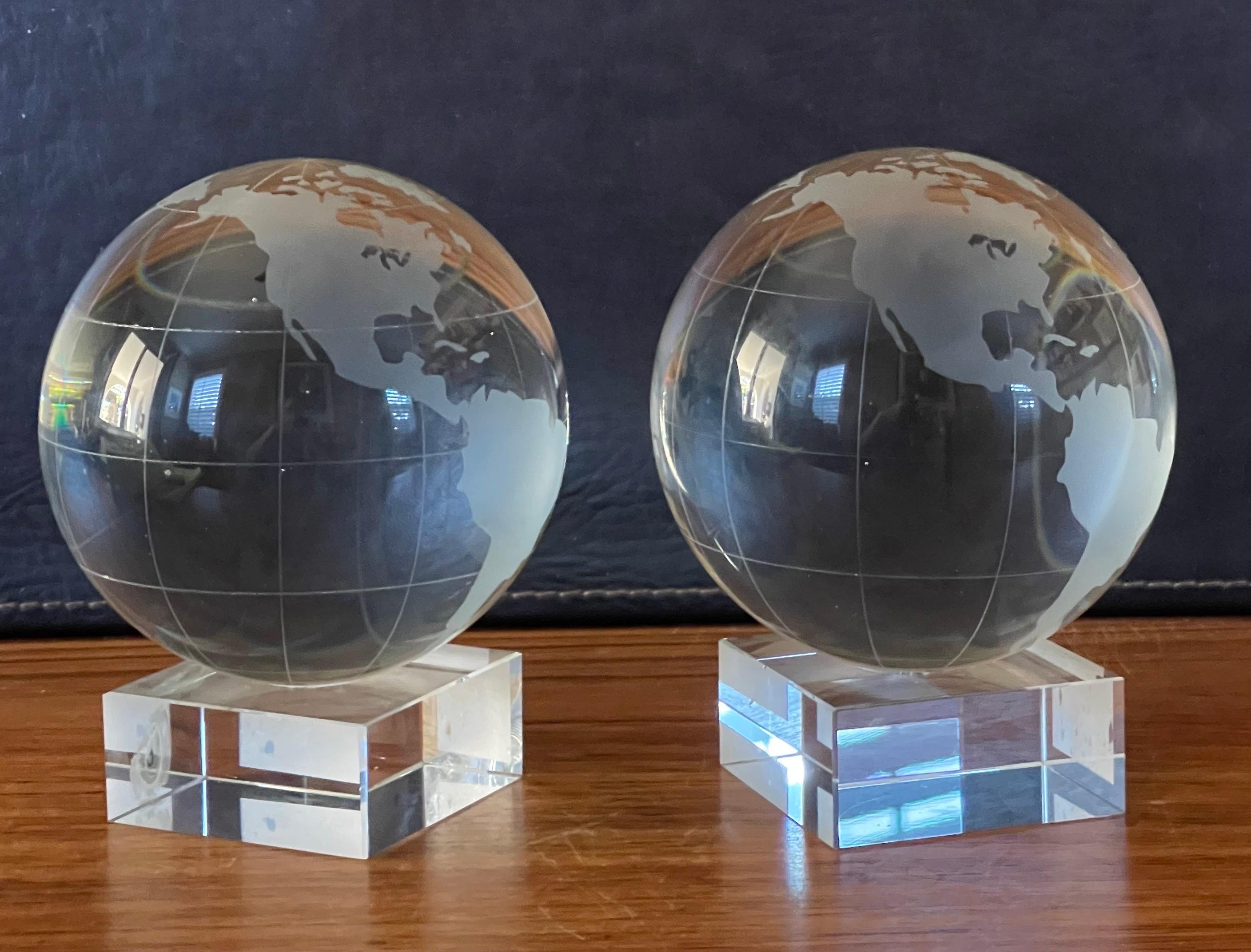 Contemporary Substantial Pair of Etched Crystal Globe Bookends by Nicole Miller For Sale