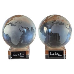 Substantial Pair of Etched Crystal Globe Bookends by Nicole Miller