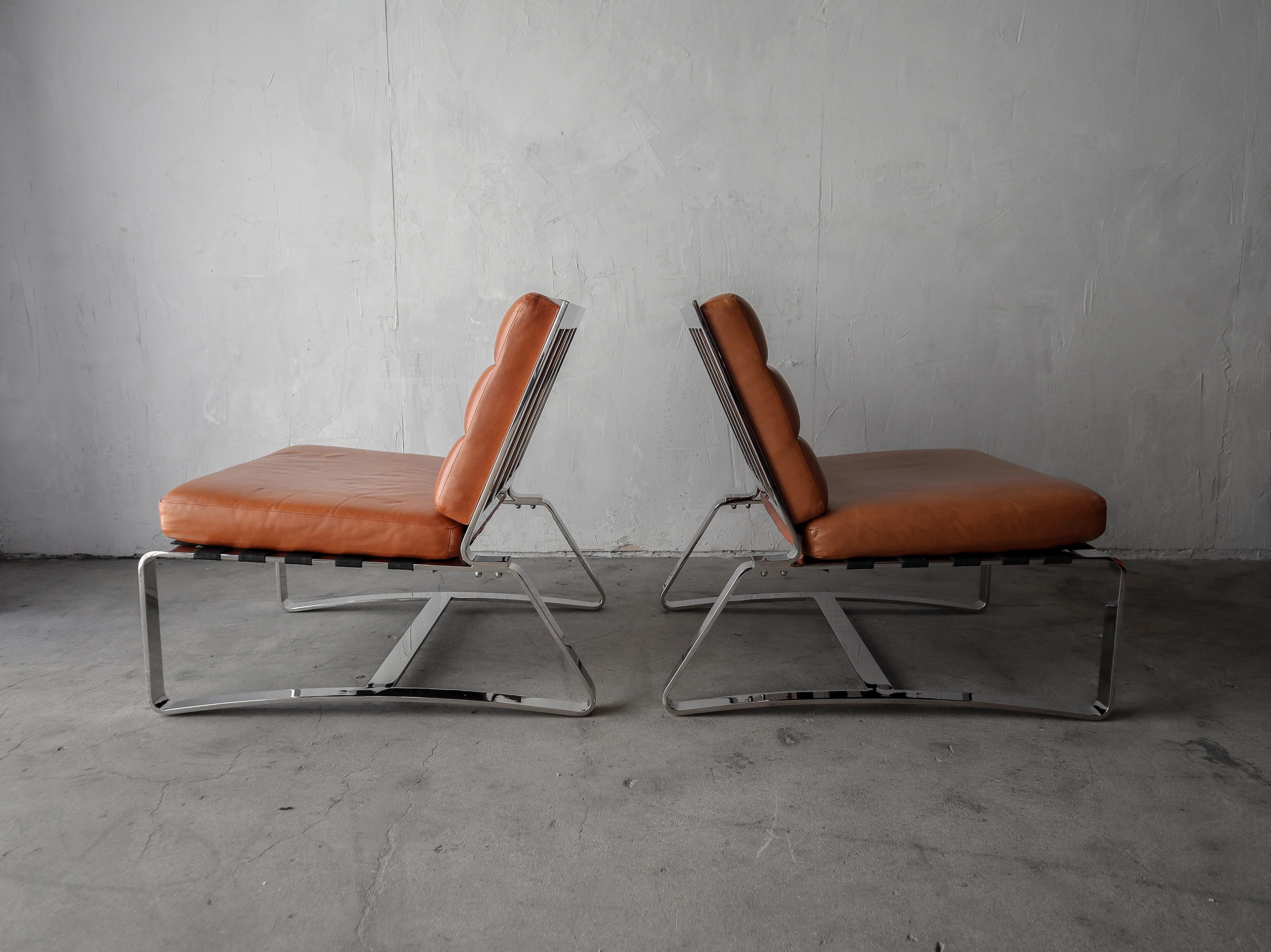 Mid-Century Modern Substantial Pair of Italian Stainless Steel and Leather Lounge Chairs For Sale