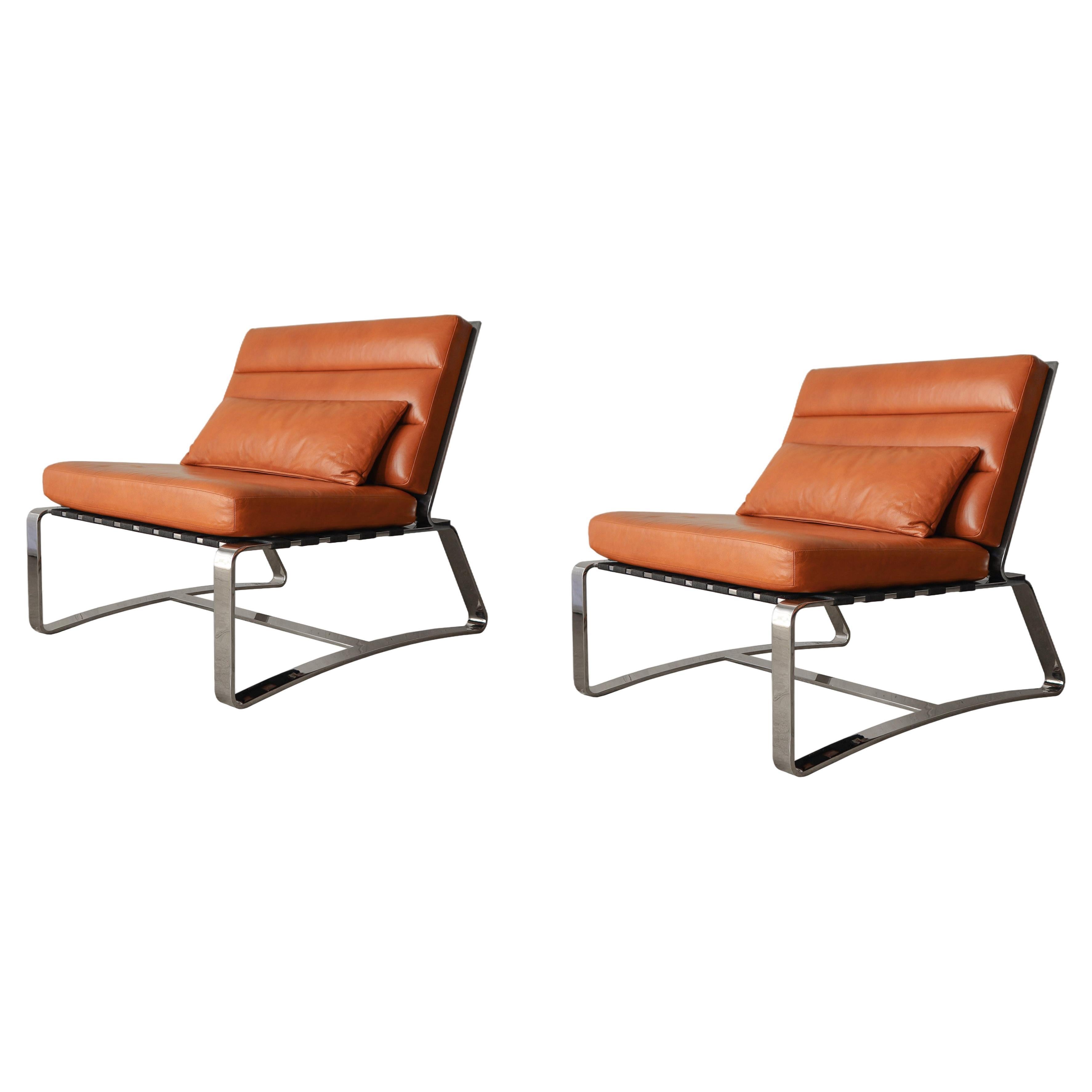 Substantielle paire de chaises longues italiennes en acier inoxydable et cuir