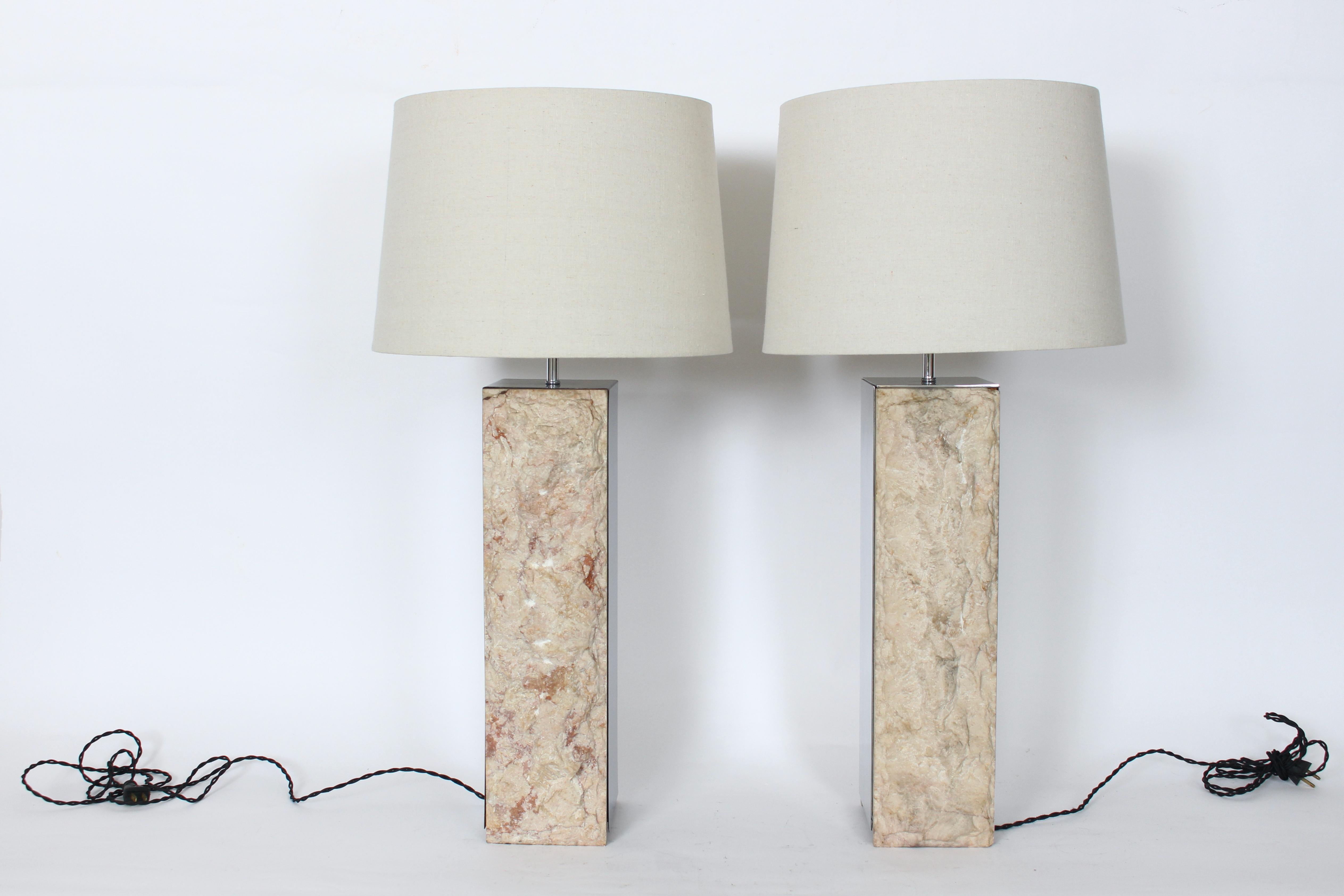 Pair of Laurel Lamp Co. attributed Rough Cut Marble & Polished Aluminum Table Lamps.  Featuring two, two sided panels, with two in Cream, Beige, Taupe with hints of Pink Italian Marble and two reflective (18.5H x 5D) polished Aluminum Mirrored