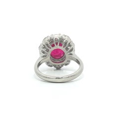 Substantial Platinum 6.45ctw GIA Large Oval Burma Ruby w/ Diamond Halo Ring