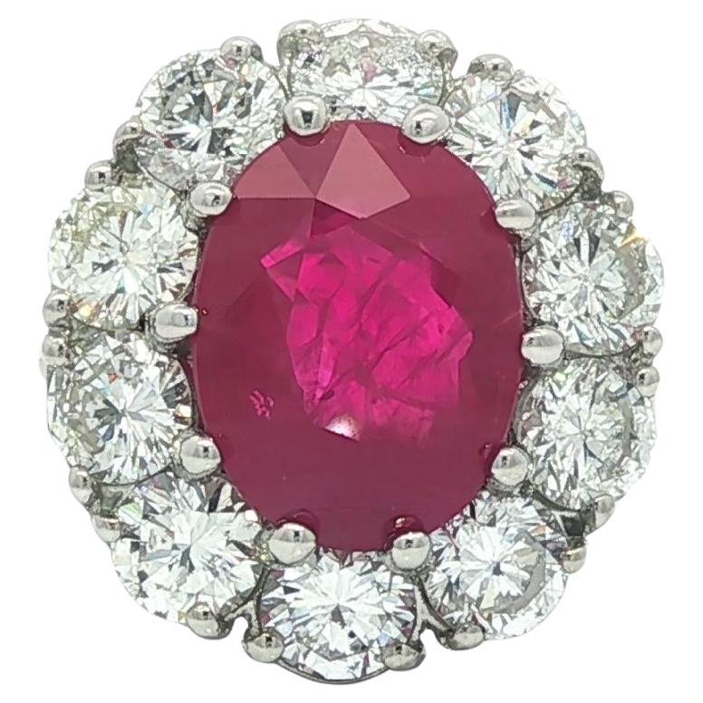 Substantial Platinum 6.45ctw GIA Large Oval Burma Ruby w/ Diamond Halo Ring