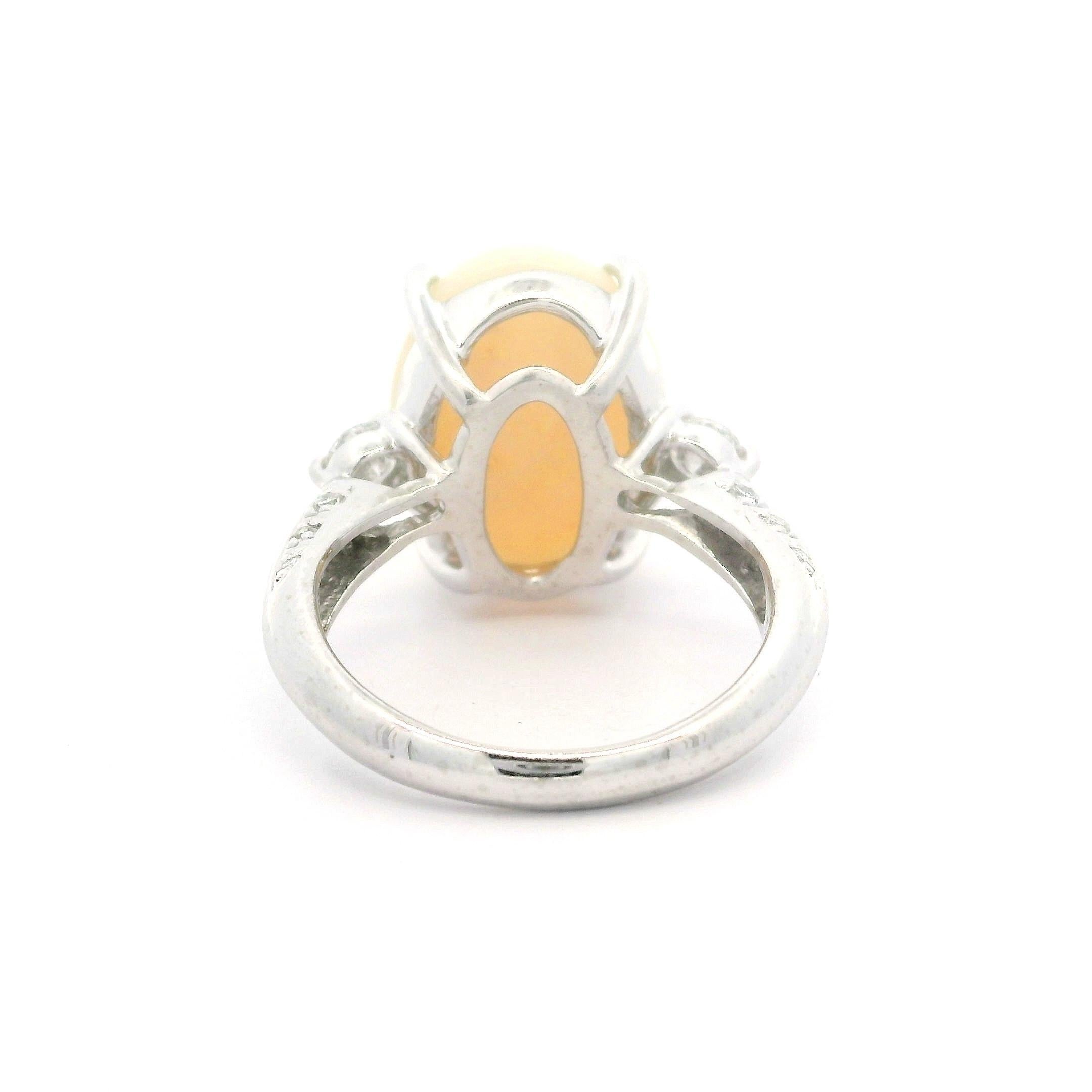 Anello da cocktail in platino con opale ovale cabochon e diamante da 6,4 carati in vendita 11