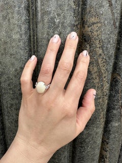 Substantial Platinum 6.4ctw Oval Cabochon Opal & Diamond Cocktail Ring