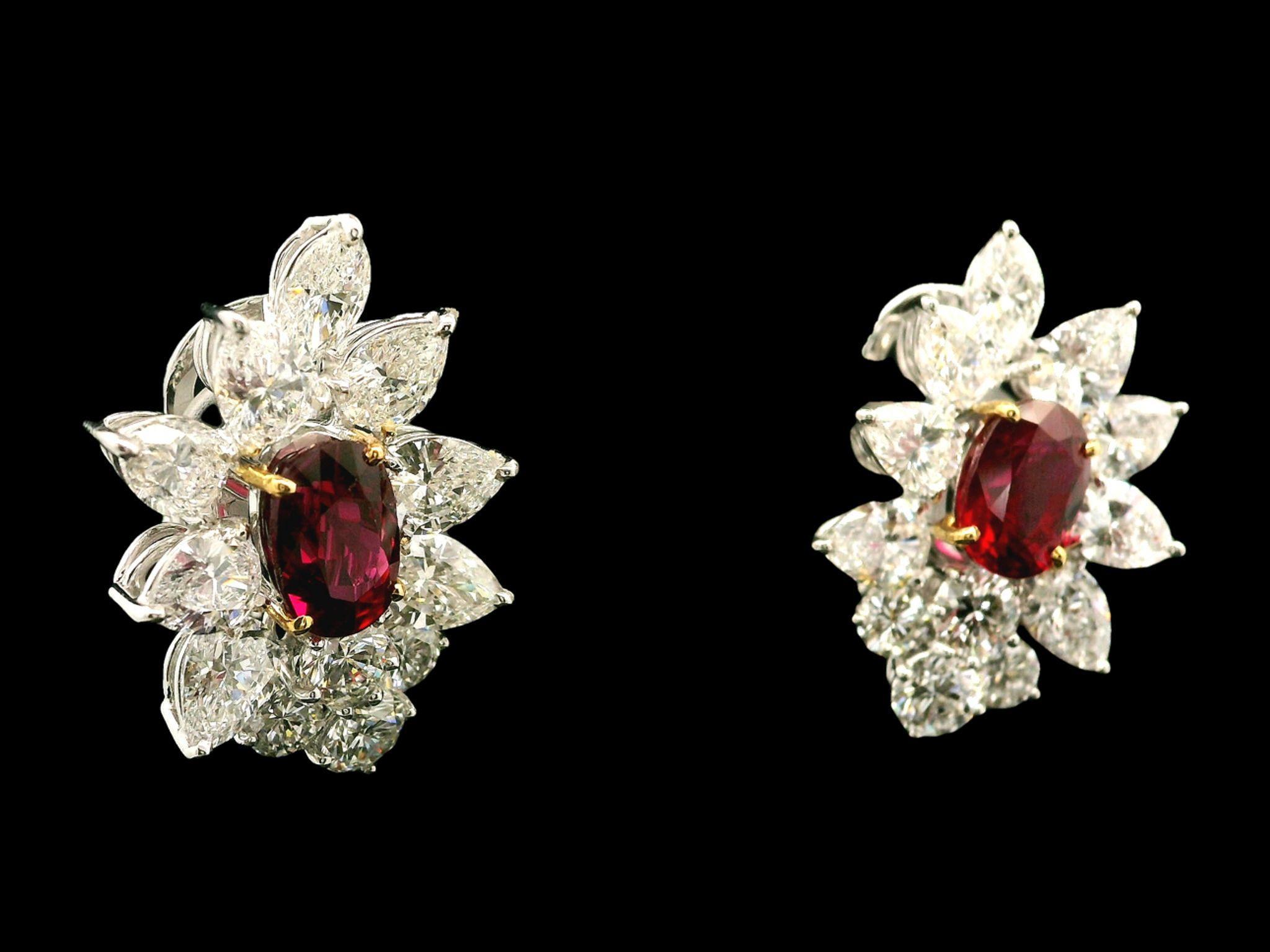 --Stone(s):--
(2) Natural Genuine Rubies - Oval Cut - Prong Set - Clean Red Color - 4.66ctw (exact)
** See Certification Details Below for Complete Info on the Rubies **
(24) Natural Genuine Diamonds - Pear, Marquise & Round Brilliant Cut - Prong