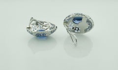 Bemerkenswerte Tansanit- und Diamant-Ohrringe aus 18k Gold