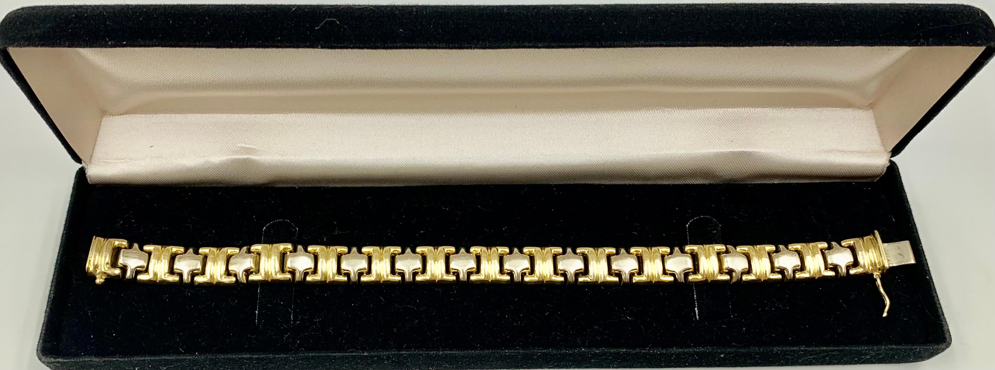 Beautiful craftsmanship, two color yellow and white 14K gold Parentesi style link bracelet.
Handcrafted, classic seamless fit. Excellent alone and as a layering bracelet, especially with another chain link bracelet or a diamond tennis bracelet. The