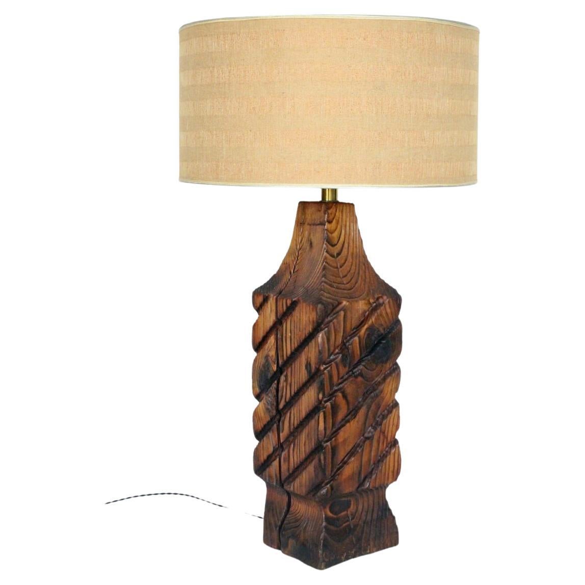 Tall California Rustic William Westerhaver WITCO Studio Cedar Table Lamp, Circa 1960. Three foot high with small footprint.. Featuring a handcrafted, burned and brushed rectangular old solid Cedar block, with diagonal cuts atop a (7W x 7.5D)