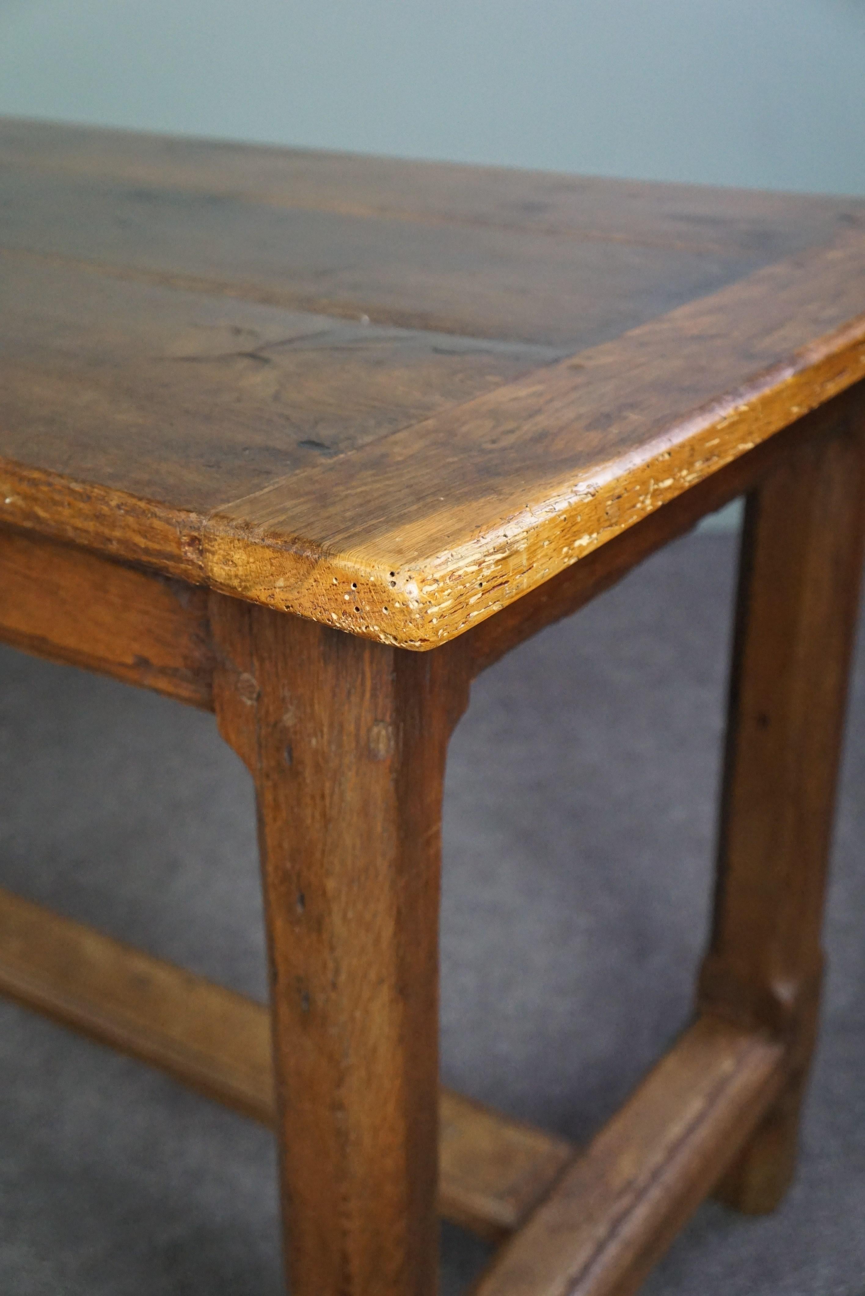 Subtle antique French oak dining table with breadboard and drawer For Sale 5
