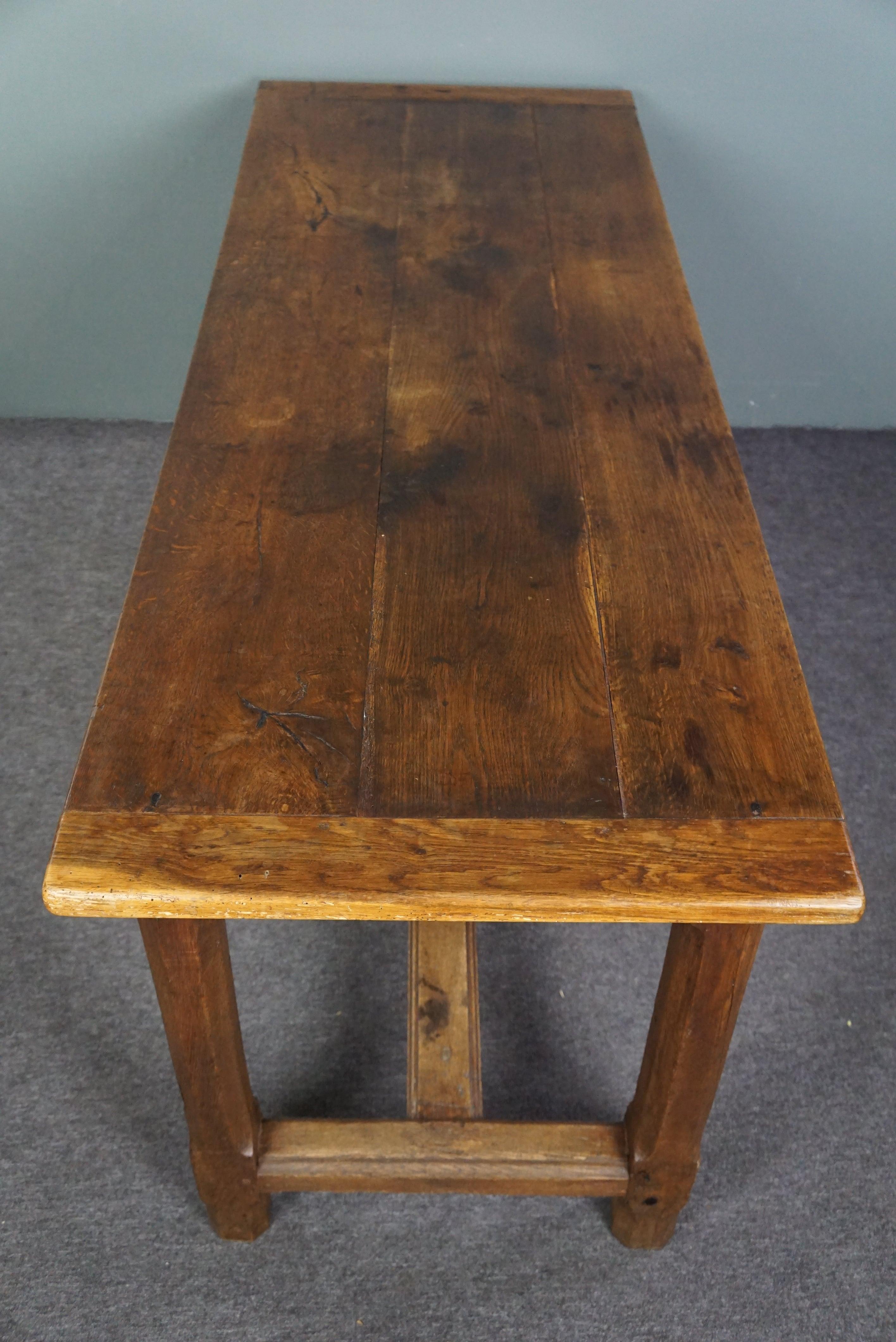 Subtle antique French oak dining table with breadboard and drawer For Sale 1