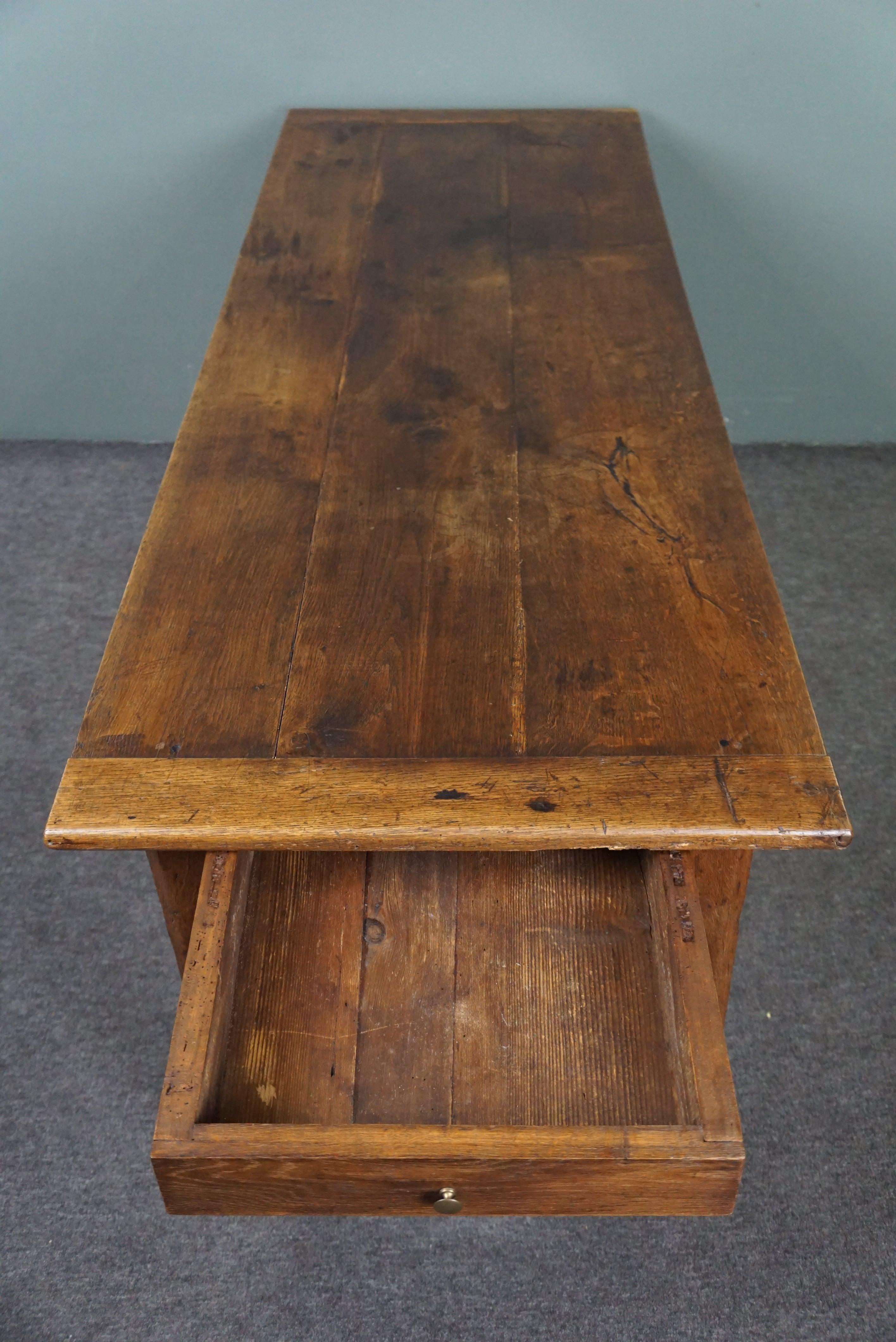 Subtle antique French oak dining table with breadboard and drawer For Sale 2