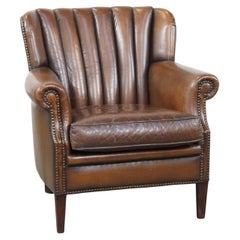 Subtle, beautifully colored sheepskin armchair with a unique design