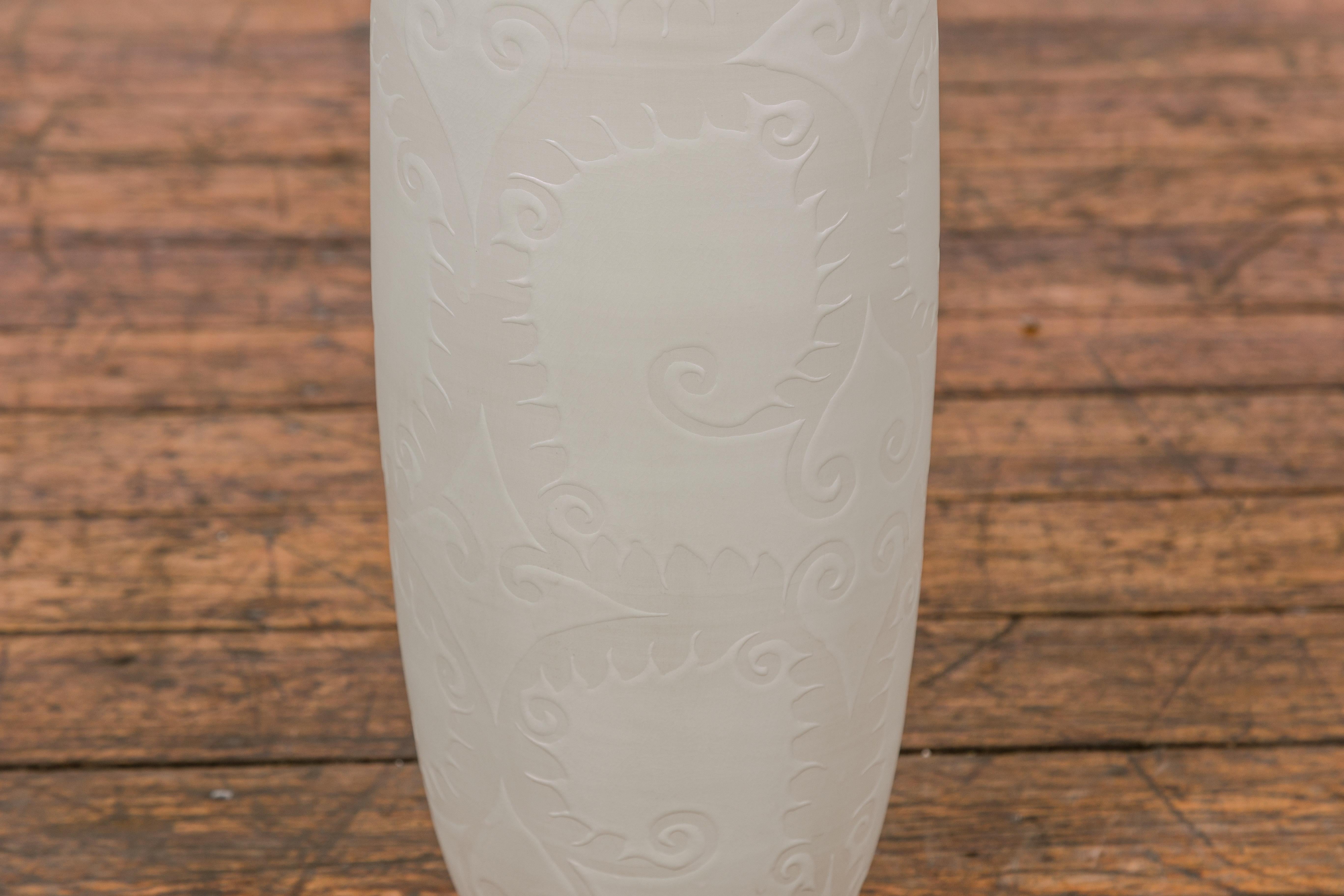 Subtle Ivory Color Tall Vase with Raised Scrolling Motifs and Narrow Mouth For Sale 2
