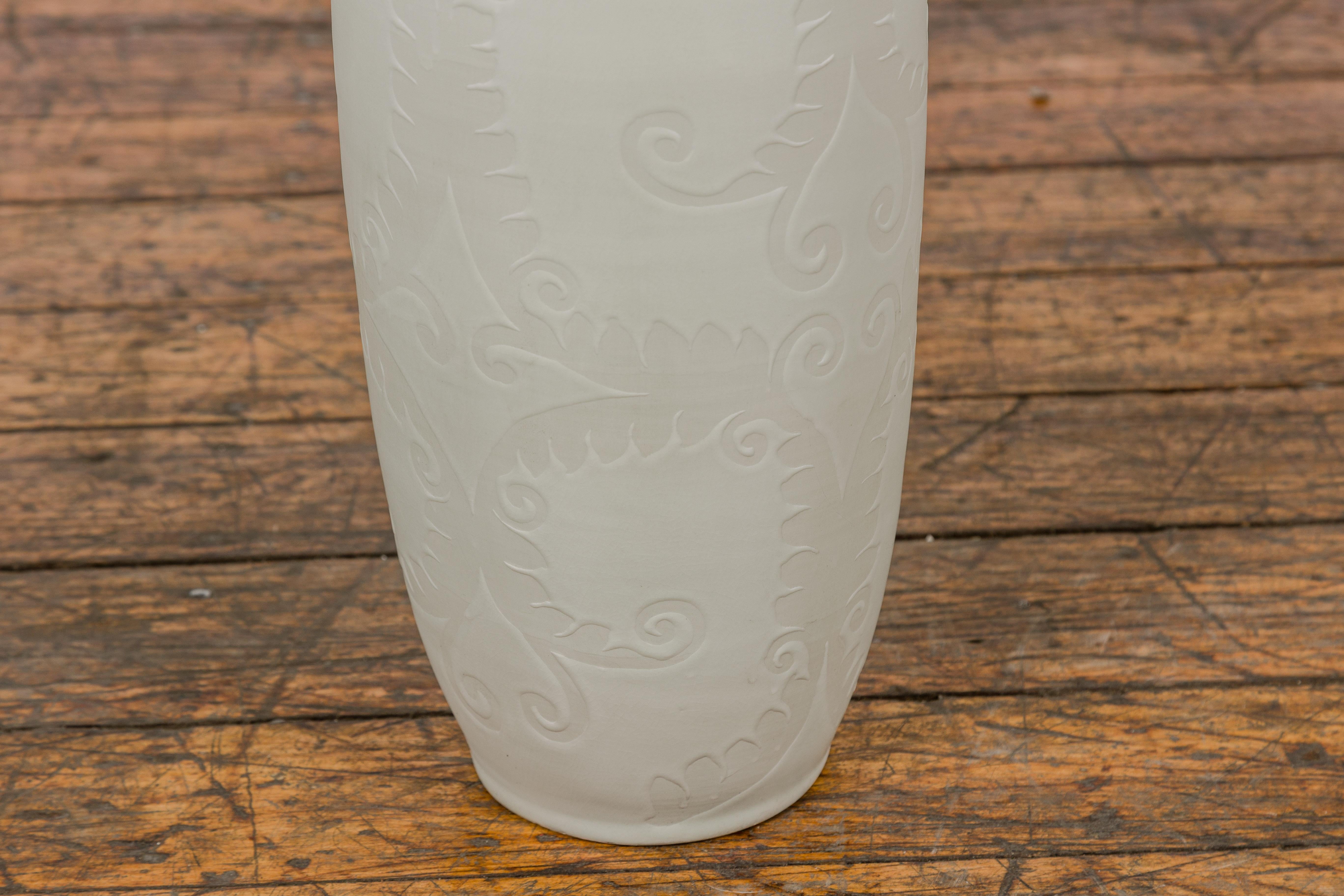 Subtle Ivory Color Tall Vase with Raised Scrolling Motifs and Narrow Mouth For Sale 3