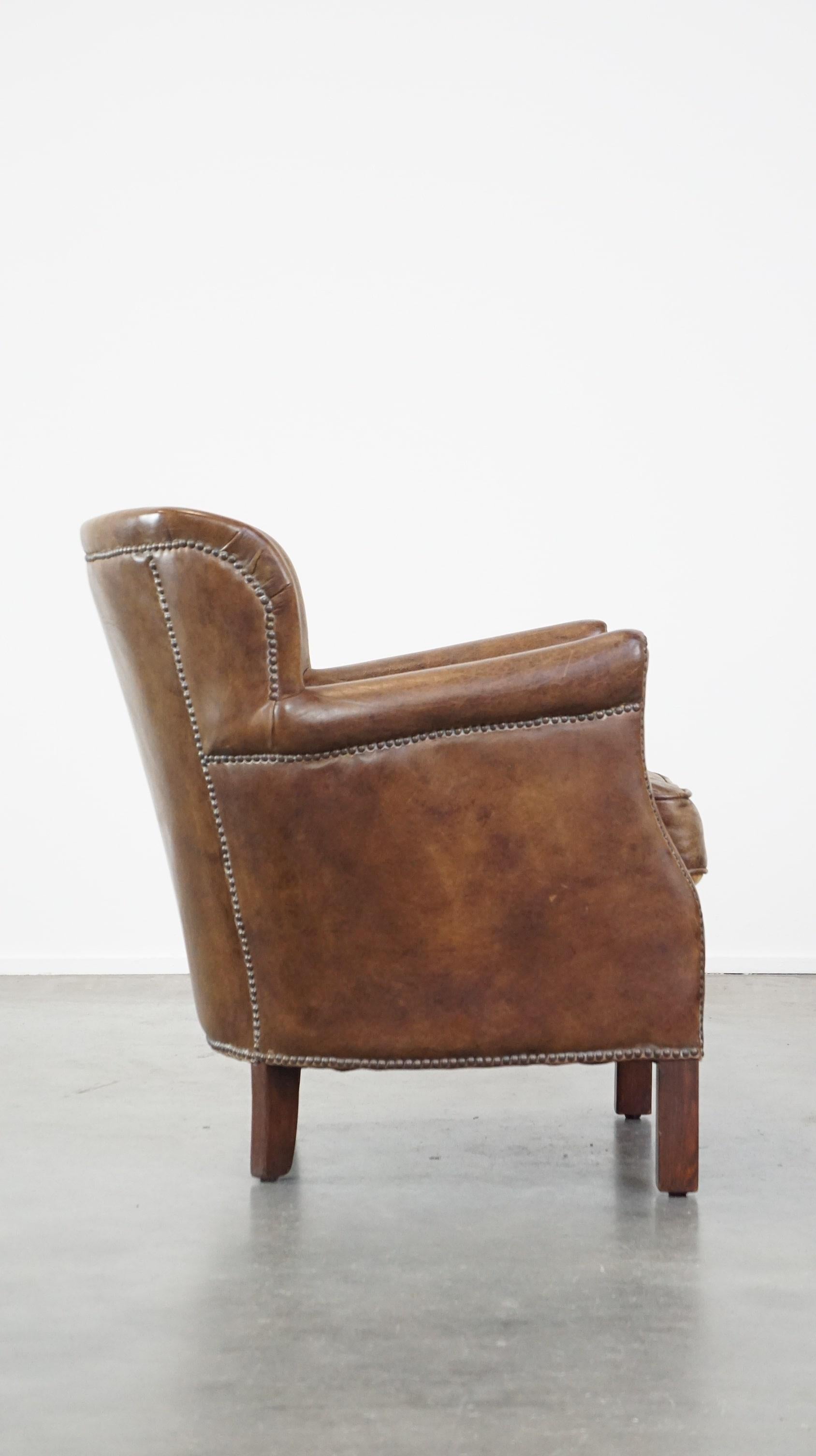 Fauteuil en cuir subtil avec un coussin d'assise réversible en kilim Bon état - En vente à Harderwijk, NL