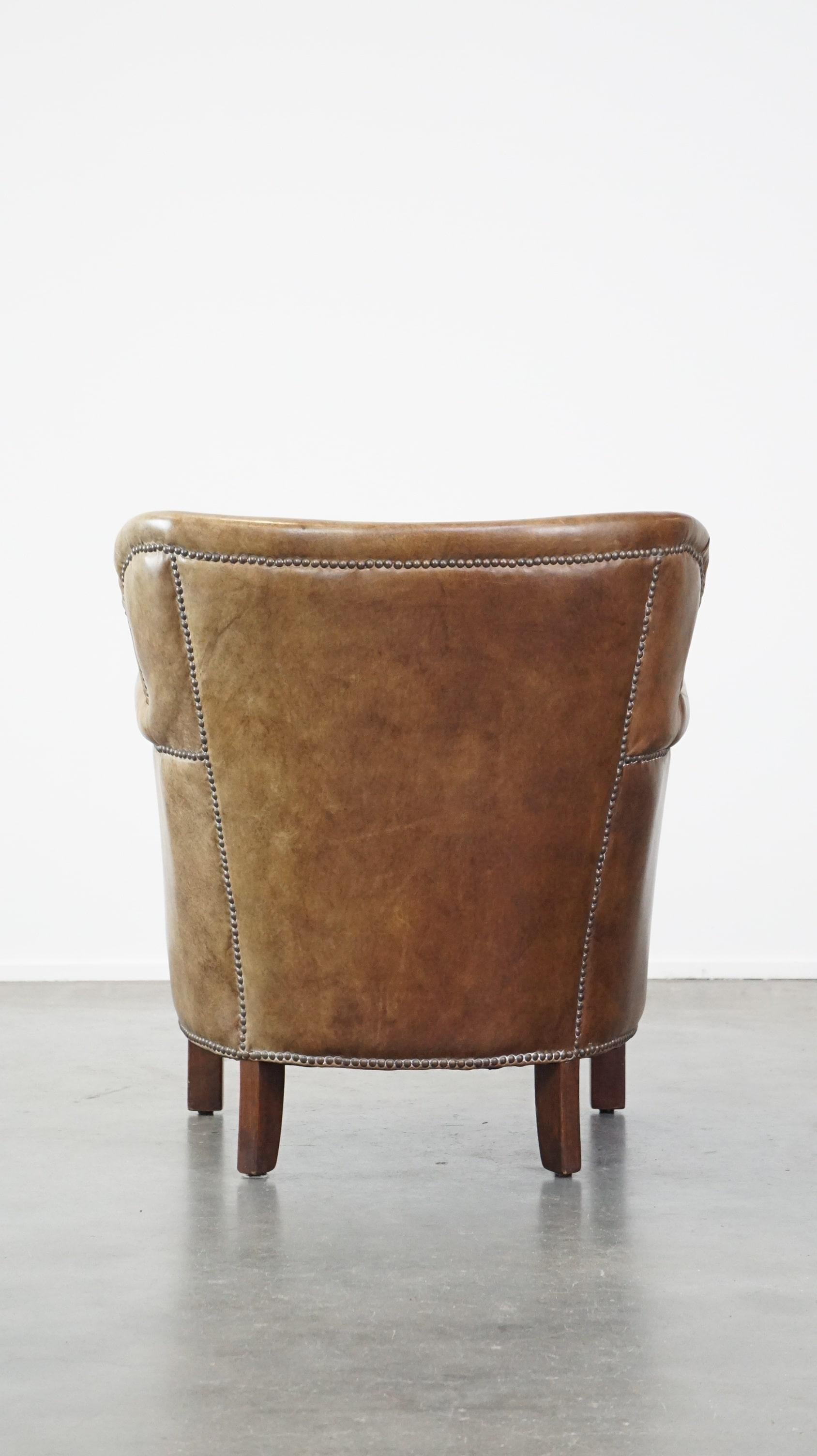 20ième siècle Fauteuil en cuir subtil avec un coussin d'assise réversible en kilim en vente