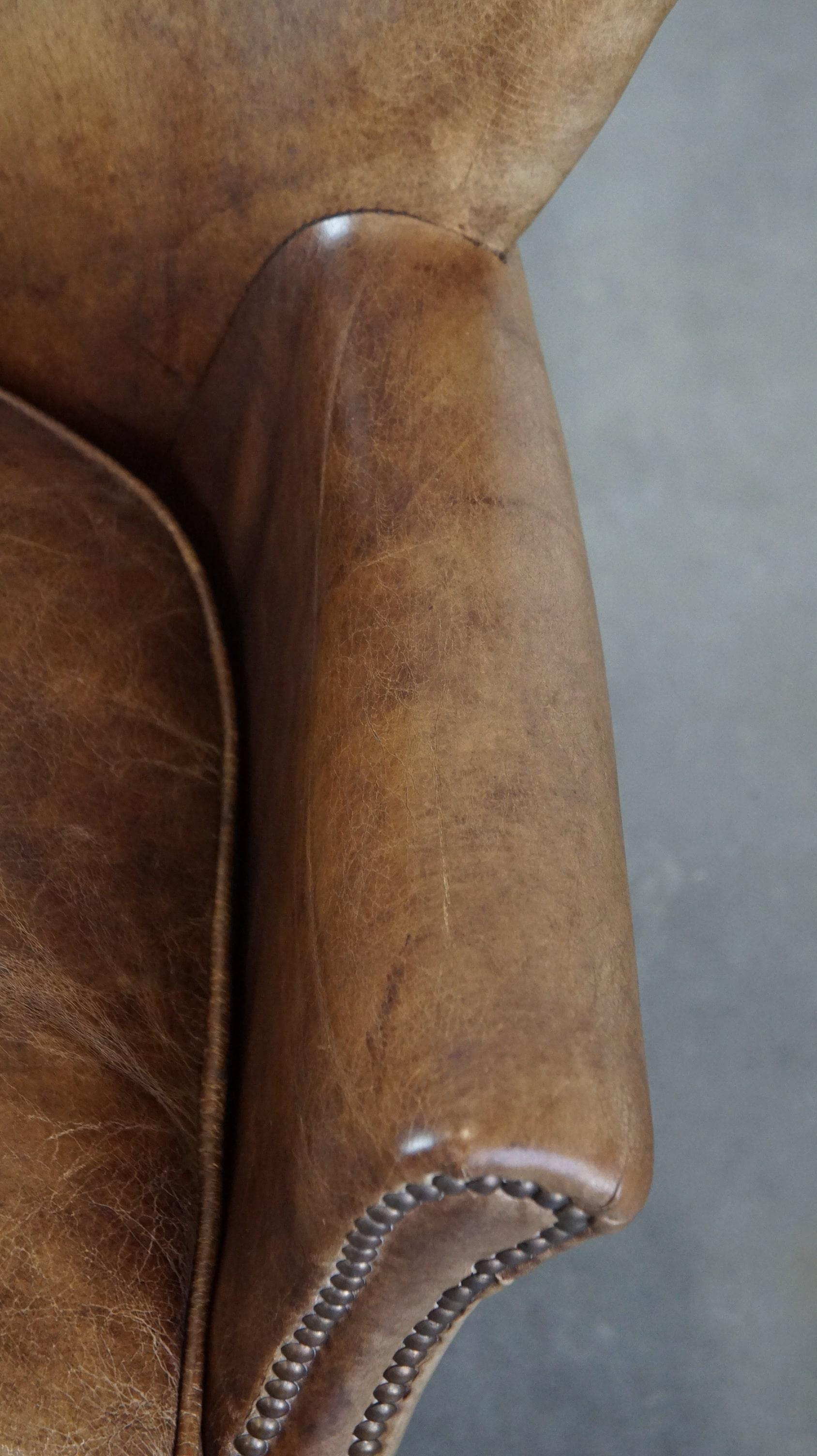 Fauteuil en cuir subtil avec un coussin d'assise réversible en kilim en vente 3